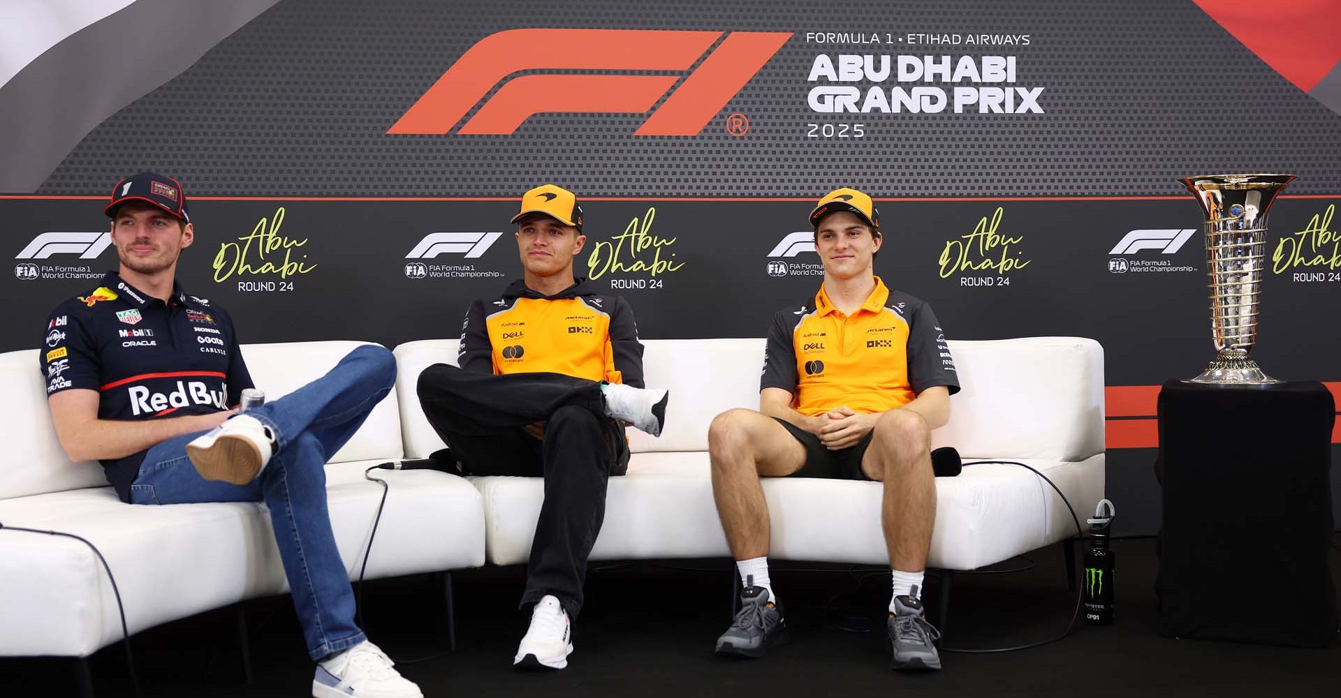ABU DHABI, UNITED ARAB EMIRATES - DECEMBER 04: 2025 F1 World Drivers Championship contenders Max Verstappen of the Netherlands and Oracle Red Bull Racing, Lando Norris of Great Britain and McLaren and Oscar Piastri of Australia and McLaren attend the Drivers Press Conference during previews ahead of the F1 Grand Prix of Abu Dhabi at Yas Marina Circuit on December 04, 2025 in Abu Dhabi, United Arab Emirates. (Photo by Clive Rose/Getty Images)