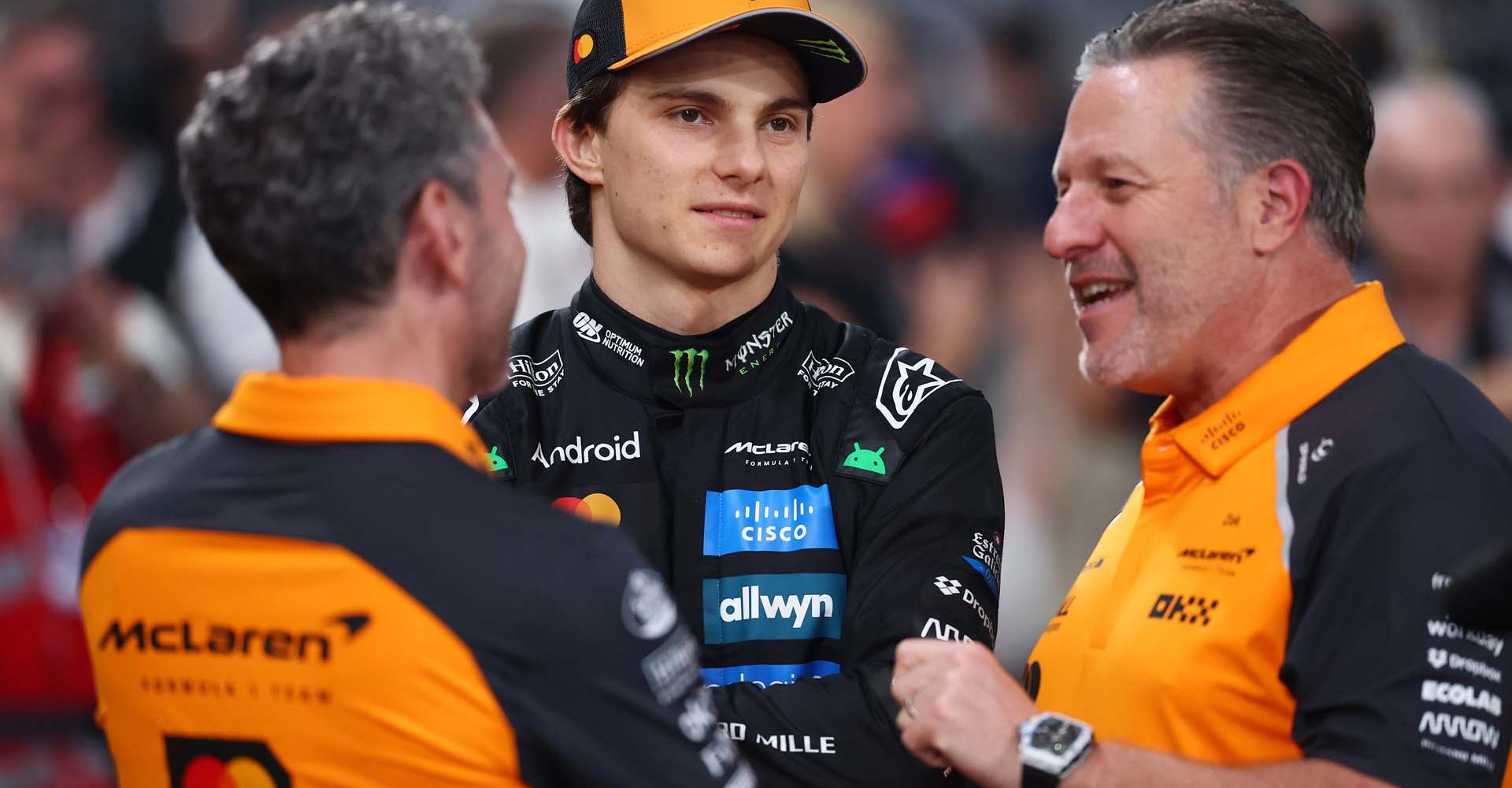 ABU DHABI, UNITED ARAB EMIRATES - DECEMBER 04: Oscar Piastri of Australia and McLaren talks with Andrea Stella, Team Principal of McLaren and Zak Brown, Chief Executive Officer of McLaren in the Pitlane during previews ahead of the F1 Grand Prix of Abu Dhabi at Yas Marina Circuit on December 04, 2025 in Abu Dhabi, United Arab Emirates. (Photo by Clive Rose/Getty Images)