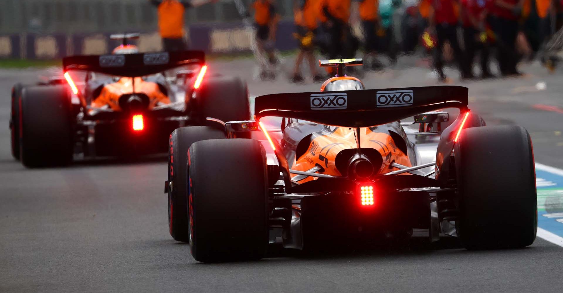 MELBOURNE, AUSTRALIA - MARCH 15: Oscar Piastri of Australia driving the (81) McLaren MCL39 Mercedes leads Lando Norris of Great Britain driving the (4) McLaren MCL39 Mercedes in the Pitlane during qualifying ahead of the F1 Grand Prix of Australia at Albert Park Grand Prix Circuit on March 15, 2025 in Melbourne, Australia. (Photo by Sam Bloxham/LAT Images)