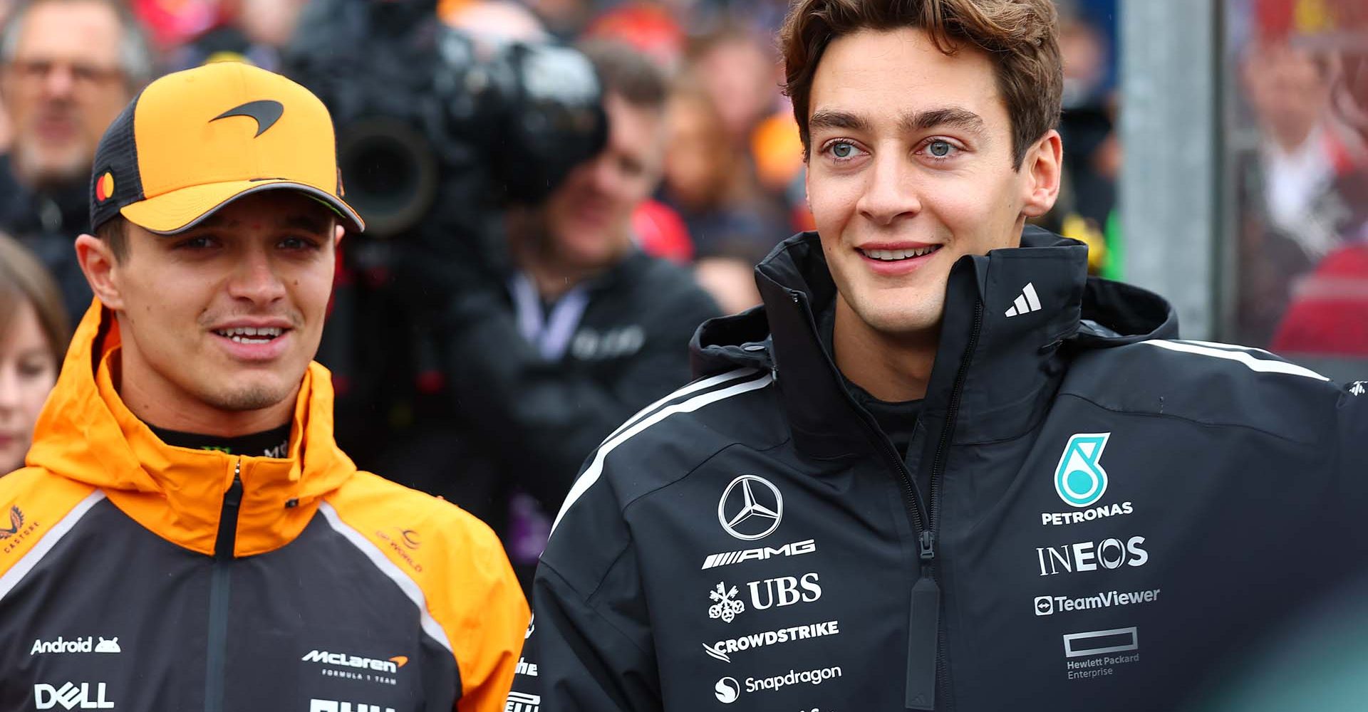 MELBOURNE, AUSTRALIA - MARCH 16: Lando Norris of Great Britain and McLaren and George Russell of Great Britain and Mercedes AMG Petronas F1 Team on the drivers parade prior to the F1 Grand Prix of Australia at Albert Park Grand Prix Circuit on March 16, 2025 in Melbourne, Australia. (Photo by Sam Bloxham/LAT Images)