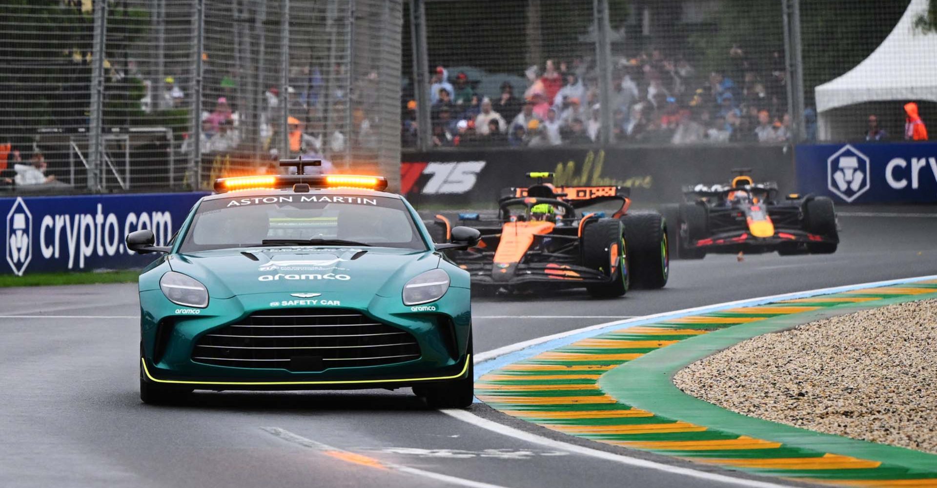 MELBOURNE, AUSTRALIA - MARCH 16: The FIA Safety Car leads Lando Norris of Great Britain driving the (4) McLaren MCL39 Mercedes and Max Verstappen of the Netherlands driving the (1) Oracle Red Bull Racing RB21 on track during the F1 Grand Prix of Australia at Albert Park Grand Prix Circuit on March 16, 2025 in Melbourne, Australia. (Photo by Clive Mason/Getty Images) // Getty Images / Red Bull Content Pool // SI202503160088 // Usage for editorial use only //