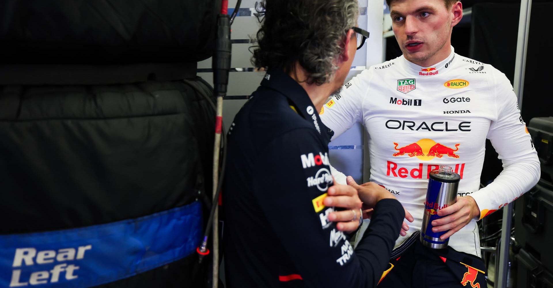 BAKU, AZERBAIJAN - SEPTEMBER 19: Laurent Mekies, Team Principal of Oracle Red Bull Racing and Max Verstappen of the Netherlands and Oracle Red Bull Racing talk in the garage during practice ahead of the F1 Grand Prix of Azerbaijan at Baku City Circuit on September 19, 2025 in Baku, Azerbaijan. (Photo by Mark Thompson/Getty Images) // Getty Images / Red Bull Content Pool // SI202509190352 // Usage for editorial use only //