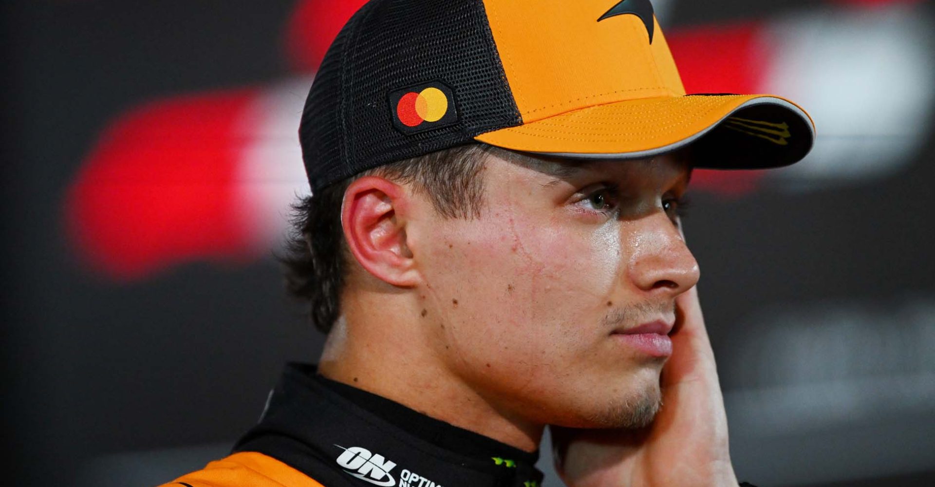 BAHRAIN, BAHRAIN - APRIL 12: Sixth placed qualifier Lando Norris of Great Britain and McLaren is interviewed during qualifying ahead of the F1 Grand Prix of Bahrain at Bahrain International Circuit on April 12, 2025 in Bahrain, Bahrain. (Photo by Rudy Carezzevoli/Getty Images)