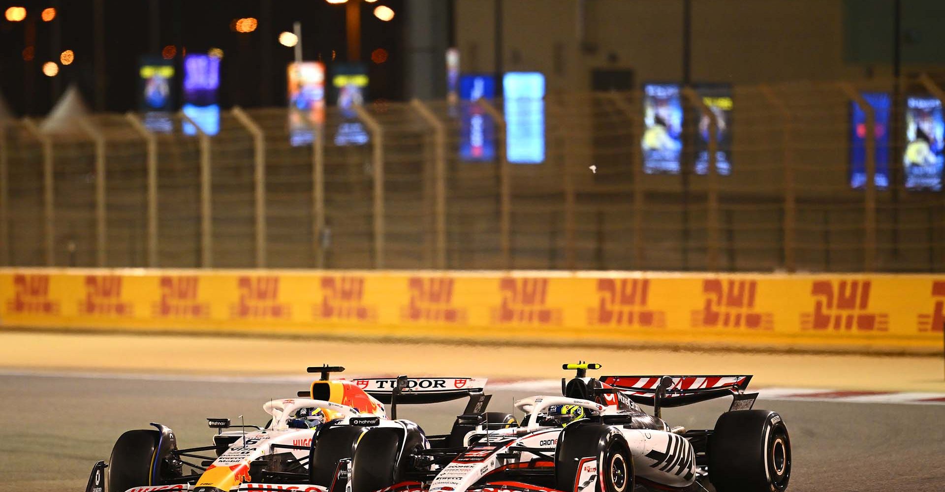 BAHRAIN, BAHRAIN - APRIL 13: Isack Hadjar of France driving the (6) Visa Cash App Racing Bulls VCARB 02 and Oliver Bearman of Great Britain driving the (87) Haas F1 VF-25 Ferrari battle for track position on track during the F1 Grand Prix of Bahrain at Bahrain International Circuit on April 13, 2025 in Bahrain, Bahrain. (Photo by Clive Mason/Getty Images)