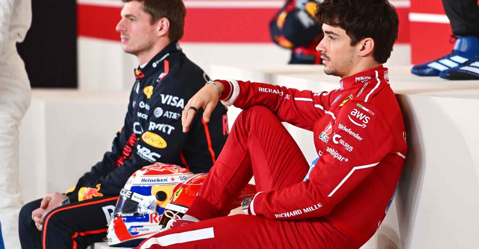 BAHRAIN, BAHRAIN - FEBRUARY 26: Max Verstappen of the Netherlands and Oracle Red Bull Racing and Charles Leclerc of Monaco and Scuderia Ferrari look on during drivers photocall prior to F1 Testing at Bahrain International Circuit on February 26, 2025 in Bahrain, Bahrain. (Photo by Rudy Carezzevoli/Getty Images) // Getty Images / Red Bull Content Pool // SI202502260677 // Usage for editorial use only //