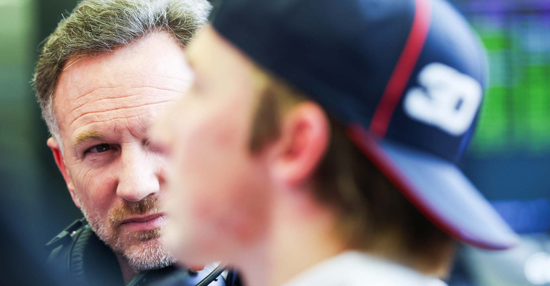 BAHRAIN, BAHRAIN - FEBRUARY 27: Christian Horner, Team Principal of Oracle Red Bull Racing in the garage with Liam Lawson of New Zealand and Oracle Red Bull Racing during day two of F1 Testing at Bahrain International Circuit on February 27, 2025 in Bahrain, Bahrain. (Photo by Mark Thompson/Getty Images) // Getty Images / Red Bull Content Pool // SI202502270740 // Usage for editorial use only //
