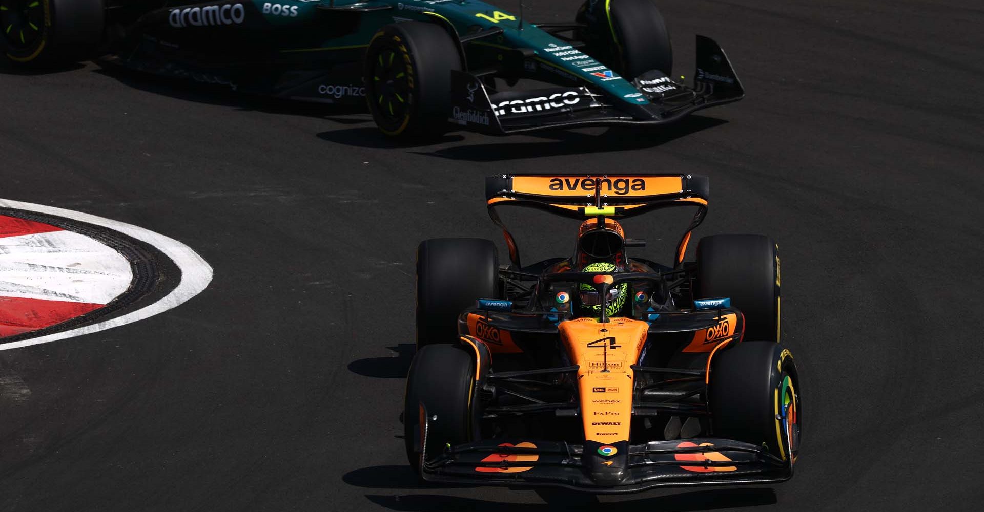SHANGHAI, CHINA - MARCH 21: Lando Norris of Great Britain driving the (4) McLaren MCL39 Mercedes leads Fernando Alonso of Spain driving the (14) Aston Martin F1 Team AMR25 Mercedes on track during practice ahead of the F1 Grand Prix of China at Shanghai International Circuit on March 21, 2025 in Shanghai, China. (Photo by Zak Mauger/LAT Images)