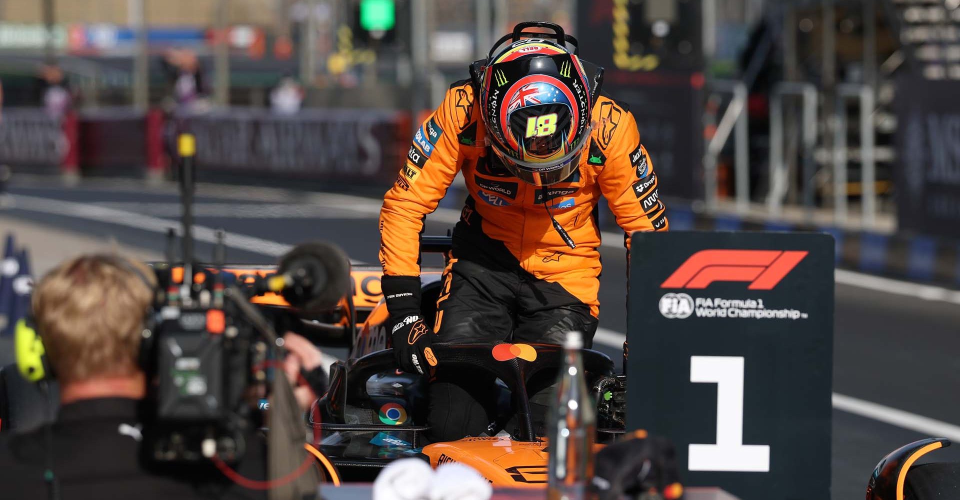 SHANGHAI, CHINA - MARCH 22: Pole position qualifier Oscar Piastri of Australia and McLaren gets out of the car in parc ferme during qualifying ahead of the F1 Grand Prix of China at Shanghai International Circuit on March 22, 2025 in Shanghai, China. (Photo by Steven Tee/LAT Images)
