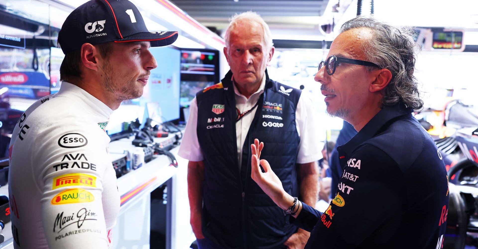 MONZA, ITALY - SEPTEMBER 05: Max Verstappen of the Netherlands and Oracle Red Bull Racing Dr Helmut Marko, Team Consultant of Oracle Red Bull Racing and Laurent Mekies, Team Principal of Oracle Red Bull Racing talk in the garage during practice ahead of the F1 Grand Prix of Italy at Autodromo Nazionale Monza on September 05, 2025 in Monza, Italy. (Photo by Mark Thompson/Getty Images) // Getty Images / Red Bull Content Pool // SI202509050288 // Usage for editorial use only //