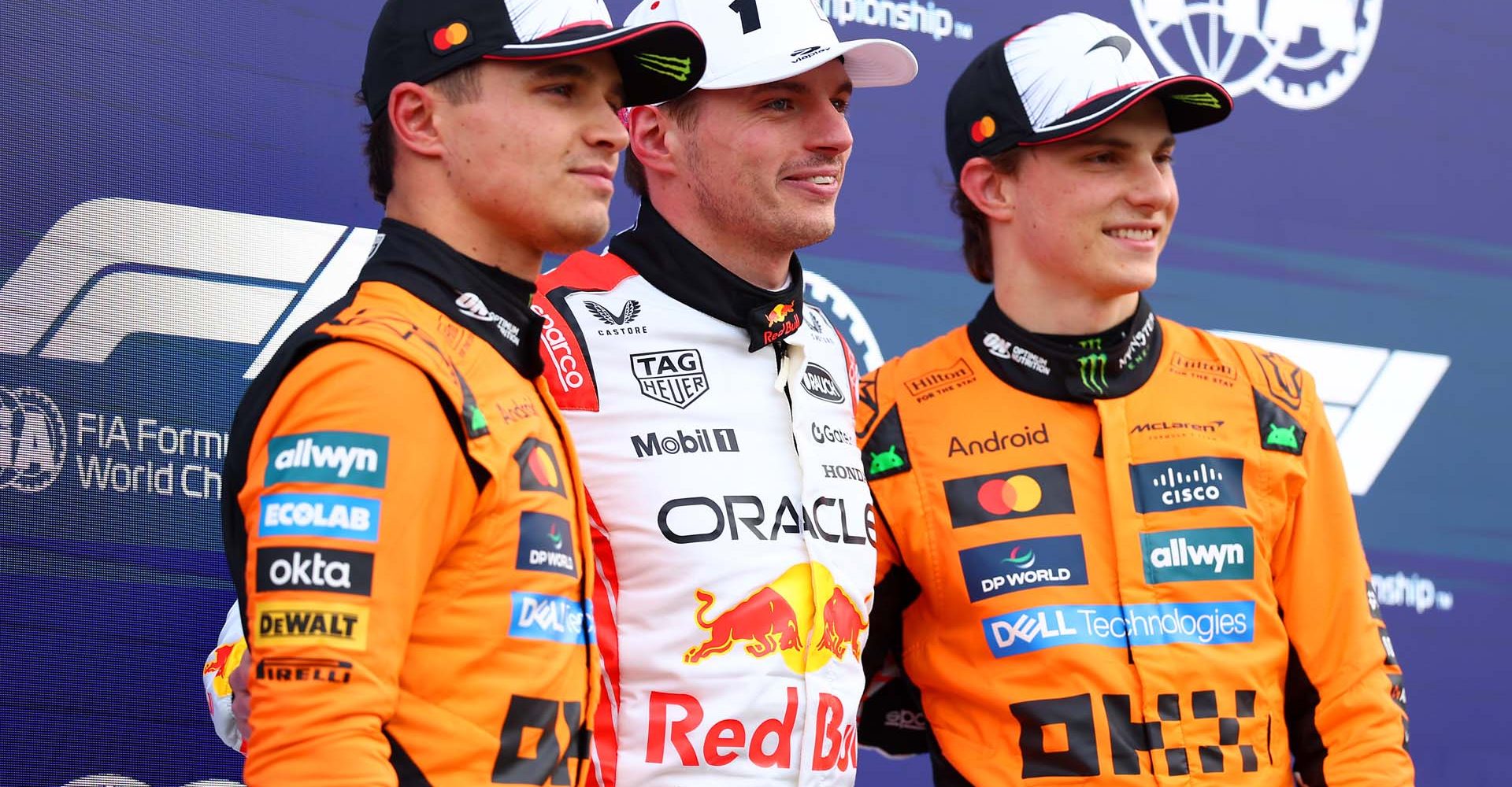 SUZUKA, JAPAN - APRIL 05: Second placed qualifier Lando Norris of Great Britain and McLaren Pole position qualifier Max Verstappen of the Netherlands and Oracle Red Bull Racing and Third placed qualifier Oscar Piastri of Australia and McLaren looks on during qualifying ahead of the F1 Grand Prix of Japan at Suzuka Circuit on April 05, 2025 in Suzuka, Japan. (Photo by Andy Hone/LAT Images)