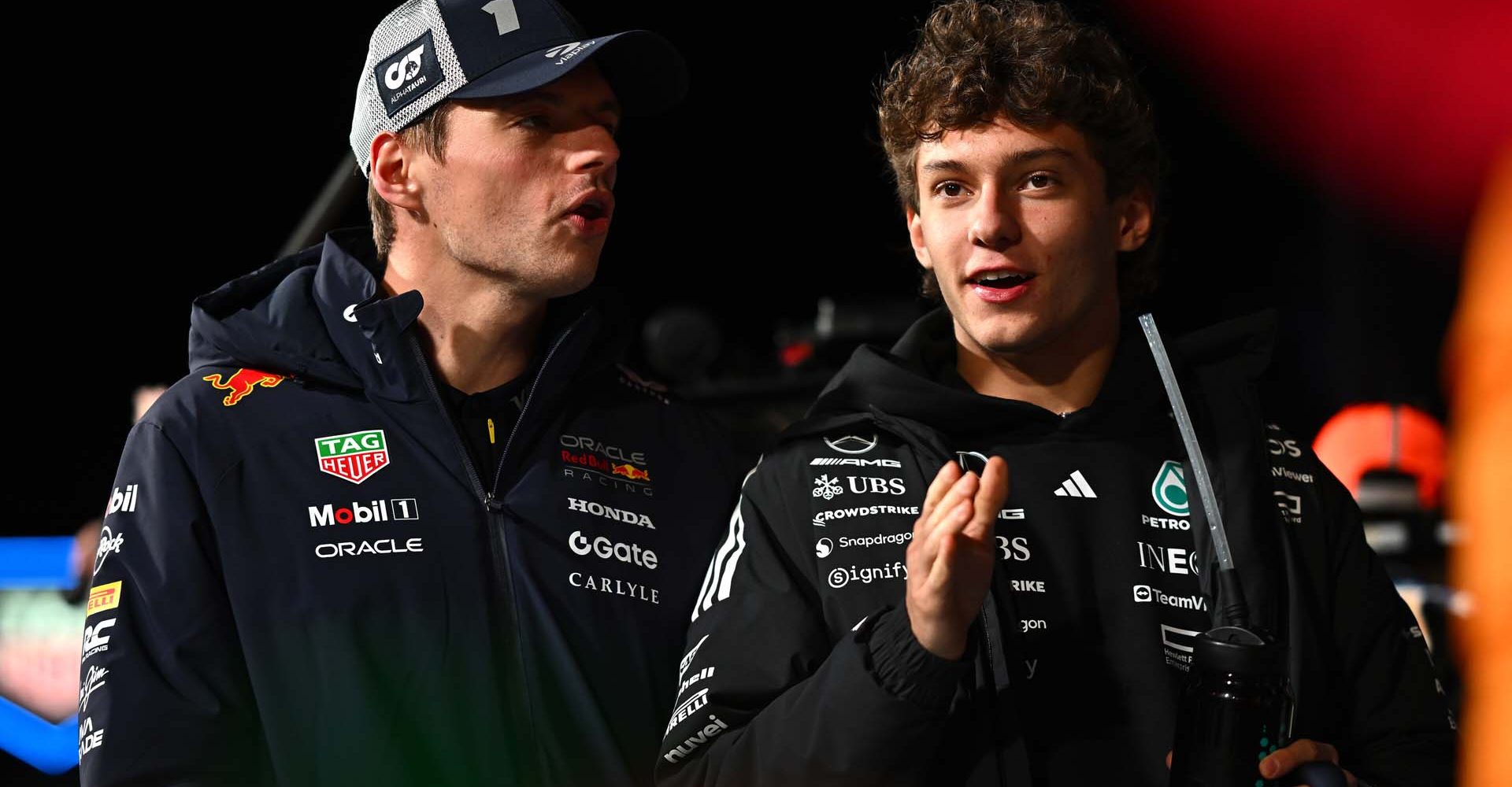 LAS VEGAS, NEVADA - NOVEMBER 22: Max Verstappen of the Netherlands and Oracle Red Bull Racing and Andrea Kimi Antonelli of Italy and Mercedes AMG Petronas F1 Team talk on the grid during the F1 Grand Prix of Las Vegas at Las Vegas Strip Circuit on November 22, 2025 in Las Vegas, Nevada. (Photo by Guido De Bortoli/LAT Images) // Getty Images / Red Bull Content Pool // SI202511230577 // Usage for editorial use only //