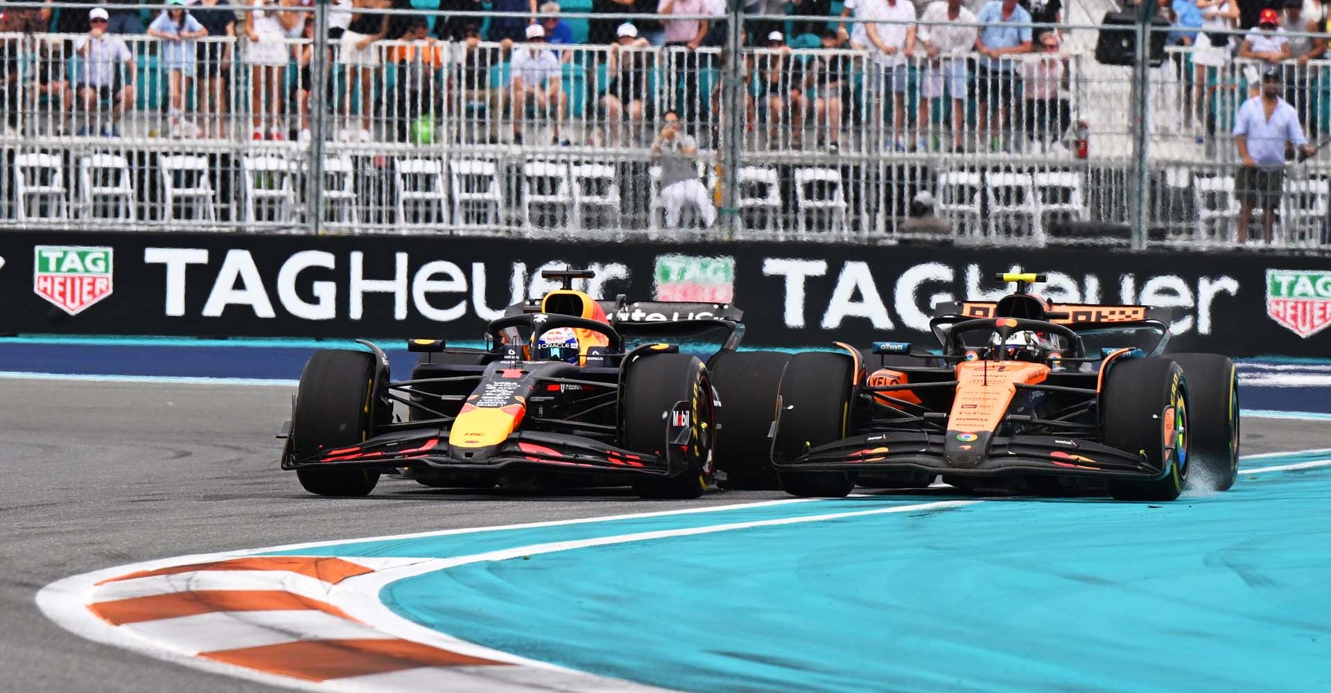 MIAMI, FLORIDA - MAY 04: Max Verstappen of the Netherlands driving the (1) Oracle Red Bull Racing RB21 and Lando Norris of Great Britain driving the (4) McLaren MCL39 Mercedes battle for track position during the F1 Grand Prix of Miami at Miami International Autodrome on May 04, 2025 in Miami, Florida. (Photo by Sam Bagnall/Sutton Images)