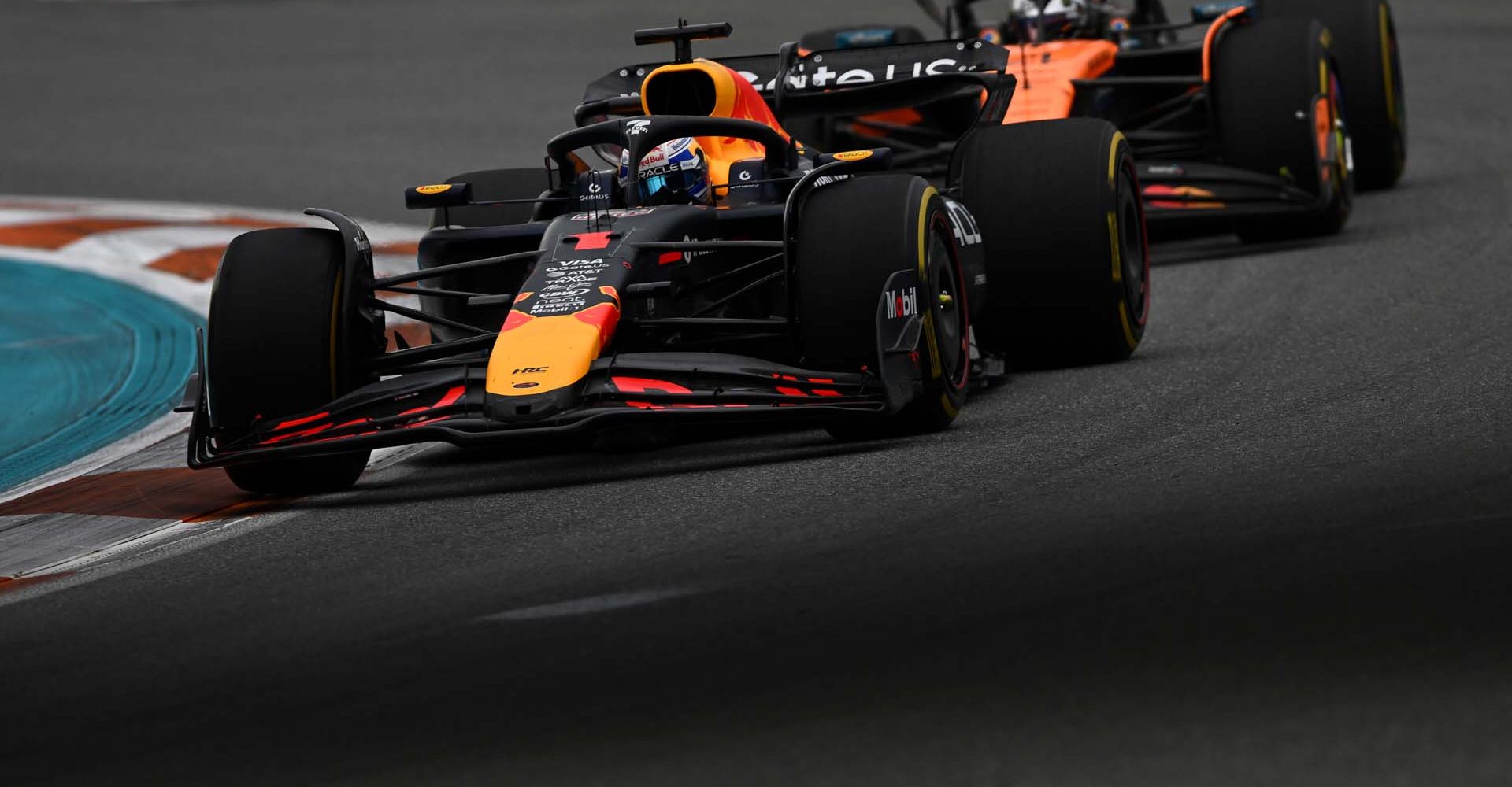 MIAMI, FLORIDA - MAY 04: Max Verstappen of the Netherlands driving the (1) Oracle Red Bull Racing RB21 leads Lando Norris of Great Britain driving the (4) McLaren MCL39 Mercedes on track during the F1 Grand Prix of Miami at Miami International Autodrome on May 04, 2025 in Miami, Florida. (Photo by Rudy Carezzevoli/Getty Images) // Getty Images / Red Bull Content Pool // SI202505043261 // Usage for editorial use only //