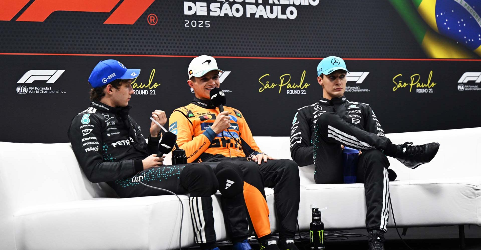 SAO PAULO, BRAZIL - NOVEMBER 08: Sprint winner Lando Norris of Great Britain and McLaren Second placed Andrea Kimi Antonelli of Italy and Mercedes AMG Petronas F1 Team and Third placed George Russell of Great Britain and Mercedes AMG Petronas F1 Team in the Drivers Press Conference during the Sprint ahead of the F1 Grand Prix of Brazil at Autodromo Jose Carlos Pace on November 08, 2025 in Sao Paulo, Brazil. (Photo by Sam Bagnall/Sutton Images)
