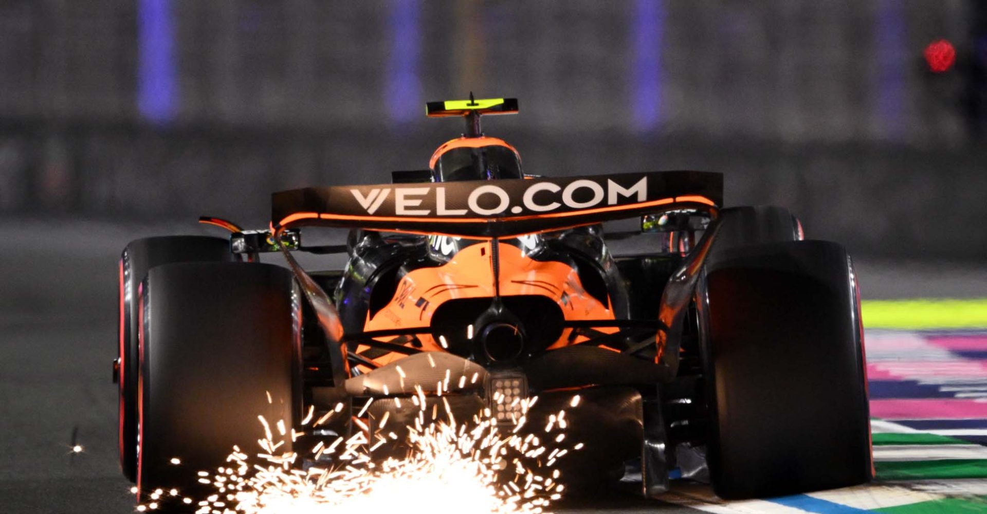 JEDDAH, SAUDI ARABIA - APRIL 19: Sparks fly behind Lando Norris of Great Britain driving the (4) McLaren MCL39 Mercedes on track during qualifying ahead of the F1 Grand Prix of Saudi Arabia at Jeddah Corniche Circuit on April 19, 2025 in Jeddah, Saudi Arabia. (Photo by Clive Mason/Getty Images)