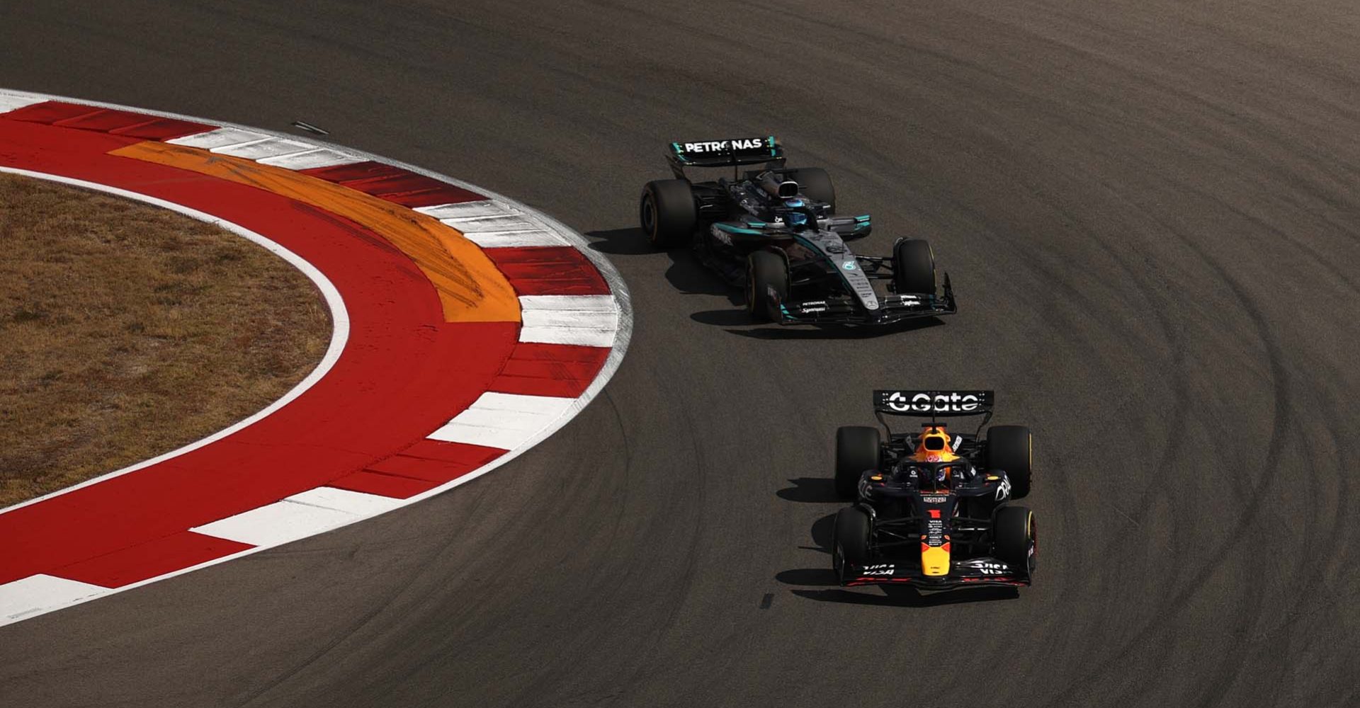 AUSTIN, TEXAS - OCTOBER 18: Max Verstappen of the Netherlands driving the (1) Oracle Red Bull Racing RB21 leads George Russell of Great Britain driving the (63) Mercedes AMG Petronas F1 Team W16 on track during the Sprint ahead of the F1 Grand Prix of United States at Circuit of The Americas on October 18, 2025 in Austin, Texas. (Photo by Jared C. Tilton/Getty Images) // Getty Images / Red Bull Content Pool // SI202510180939 // Usage for editorial use only //
