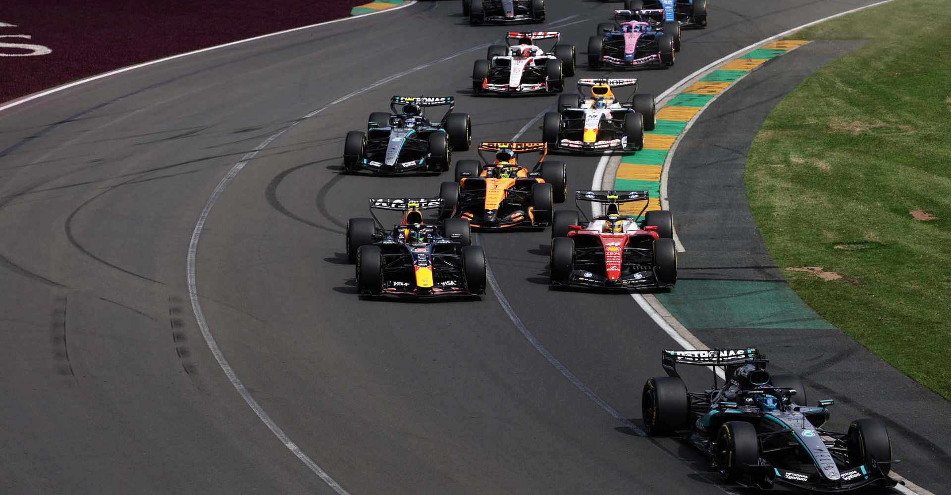 MELBOURNE, AUSTRALIA - MARCH 08: George Russell of Great Britain driving the (63) Mercedes AMG Petronas F1 Team W17 leads Lewis Hamilton of Great Britain driving the (44) Scuderia Ferrari SF-26 and Isack Hadjar of France driving the (6) Oracle Red Bull Racing RB22 Red Bull Ford at the start during the F1 Grand Prix of Australia at Albert Park Grand Prix Circuit on March 08, 2026 in Melbourne, Australia. (Photo by Mark Thompson/Getty Images) // Getty Images / Red Bull Content Pool // SI202603080123 // Usage for editorial use only //