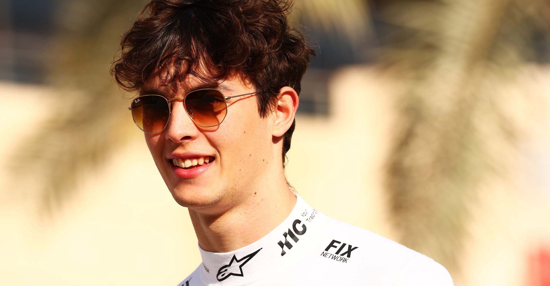 BAHRAIN, BAHRAIN - FEBRUARY 11: Oliver Bearman of Great Britain and Haas F1 looks on in the Paddock during day one of F1 Testing at Bahrain International Circuit on February 11, 2026 in Bahrain, Bahrain. (Photo by Joe Portlock/Getty Images)
