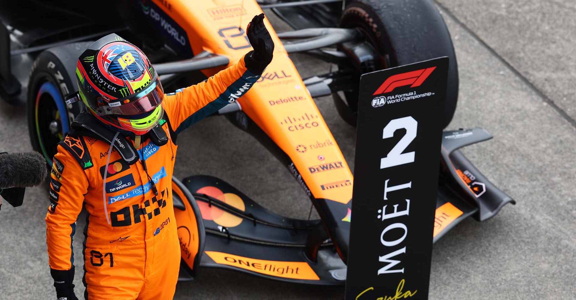 SUZUKA, JAPAN - MARCH 29: Second placed Oscar Piastri of Australia and McLaren waves from parc ferme during the F1 Grand Prix of Japan at Suzuka Circuit on March 29, 2026 in Suzuka, Japan. (Photo by Andy Hone/LAT Images)
