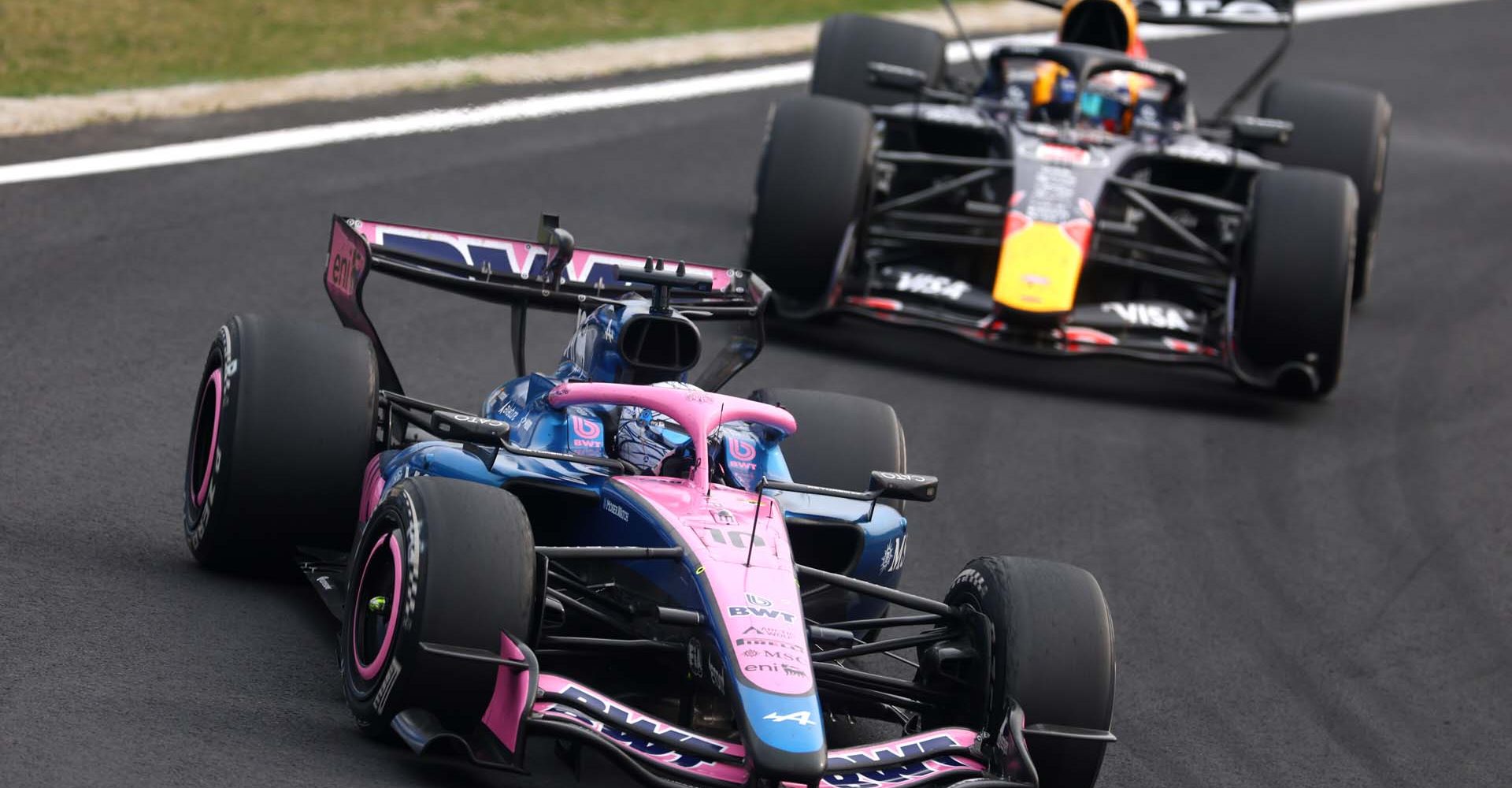 SUZUKA, JAPAN - MARCH 29: Pierre Gasly of France driving the (10) Alpine F1 A526 Mercedes leads Max Verstappen of the Netherlands driving the (3) Oracle Red Bull Racing RB22 Red Bull Ford on track during the F1 Grand Prix of Japan at Suzuka Circuit on March 29, 2026 in Suzuka, Japan. (Photo by Clive Mason/Getty Images) // Getty Images / Red Bull Content Pool // SI202603290584 // Usage for editorial use only //