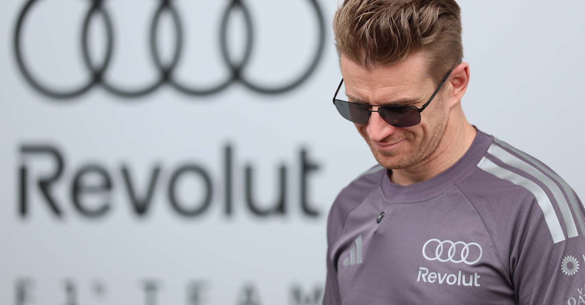 SUZUKA, JAPAN - MARCH 26: Audi, Nico Hülkenberg of Germany and Audi F1 Team looks on in the Paddock during previews ahead of the F1 Grand Prix of Japan at Suzuka Circuit on March 26, 2026 in Suzuka, Japan. (Photo by Andy Hone/LAT Images)