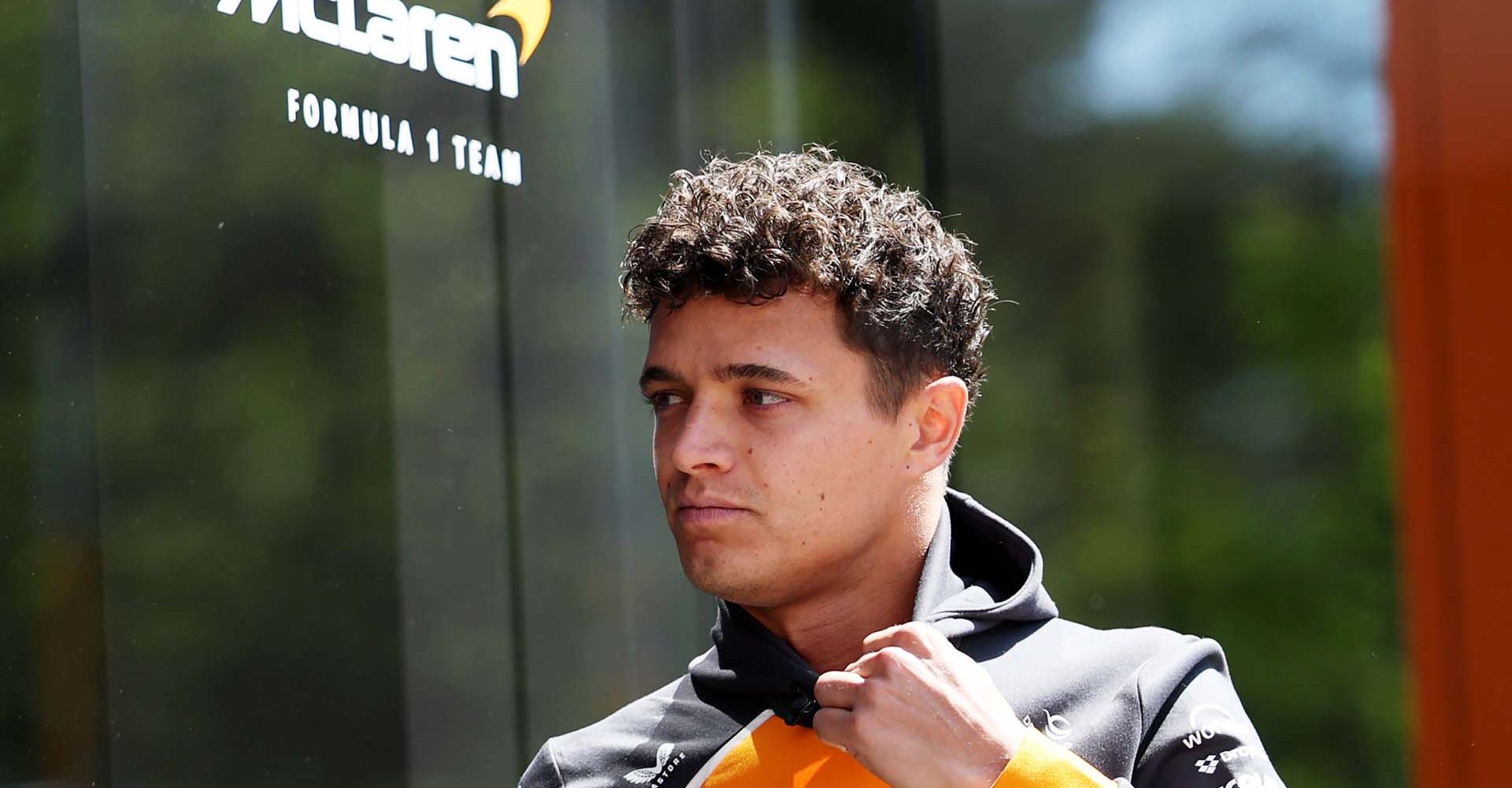 IMOLA, ITALY - MAY 16: Lando Norris of Great Britain and McLaren arrrives in the Paddock prior to practice ahead of the F1 Grand Prix of Emilia-Romagna at Autodromo Internazionale Enzo e Dino Ferrari on May 16, 2025 in Imola, Italy. (Photo by Lars Baron/LAT Images)