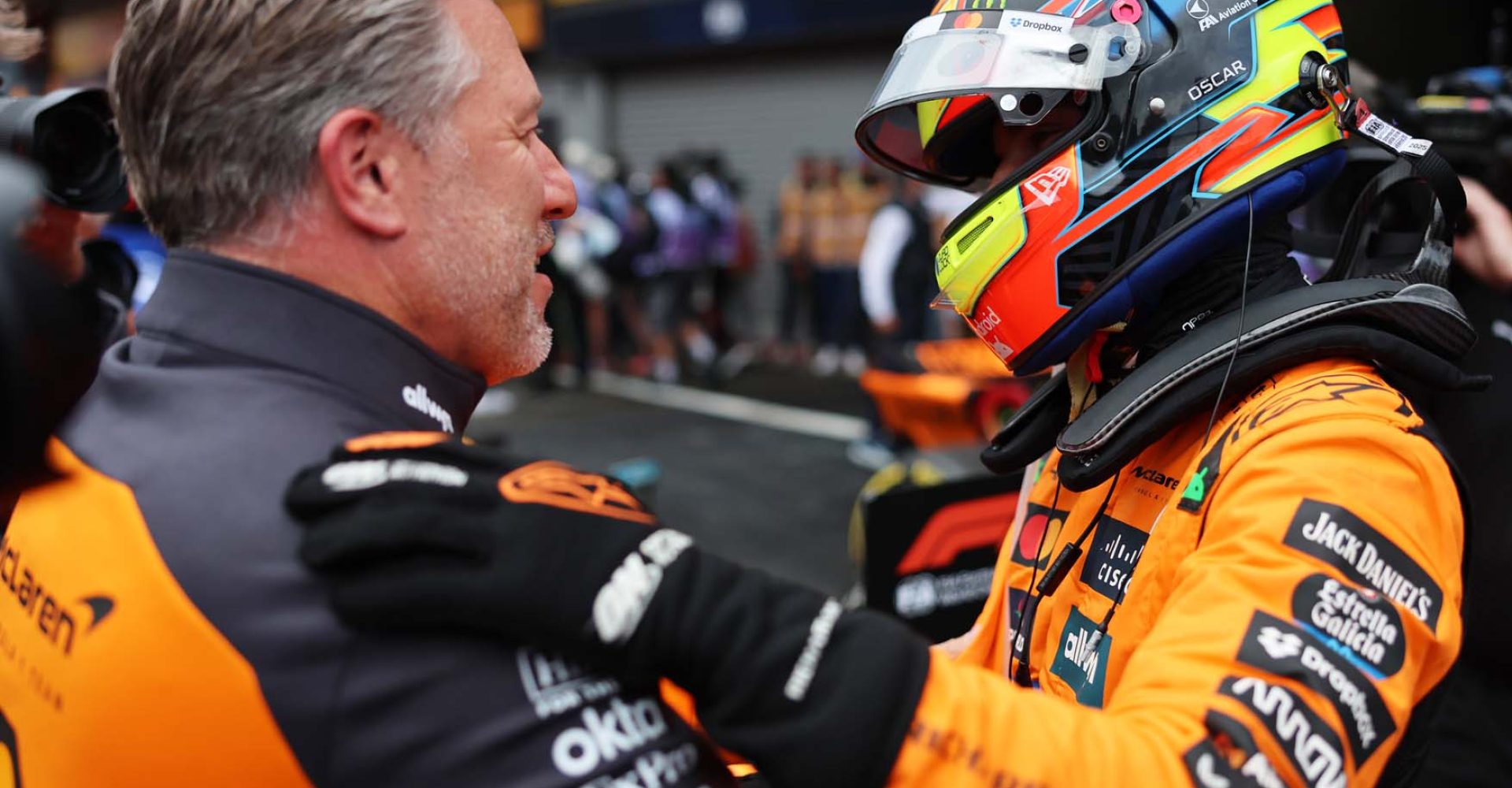 SPA, BELGIUM - JULY 27: Zak Brown, Chief Executive Officer of McLaren and Race winner Oscar Piastri of Australia and McLaren talk in parc ferme during the F1 Grand Prix of Belgium at Circuit de Spa-Francorchamps on July 27, 2025 in Spa, Belgium. (Photo by Andy Hone/LAT Images)
