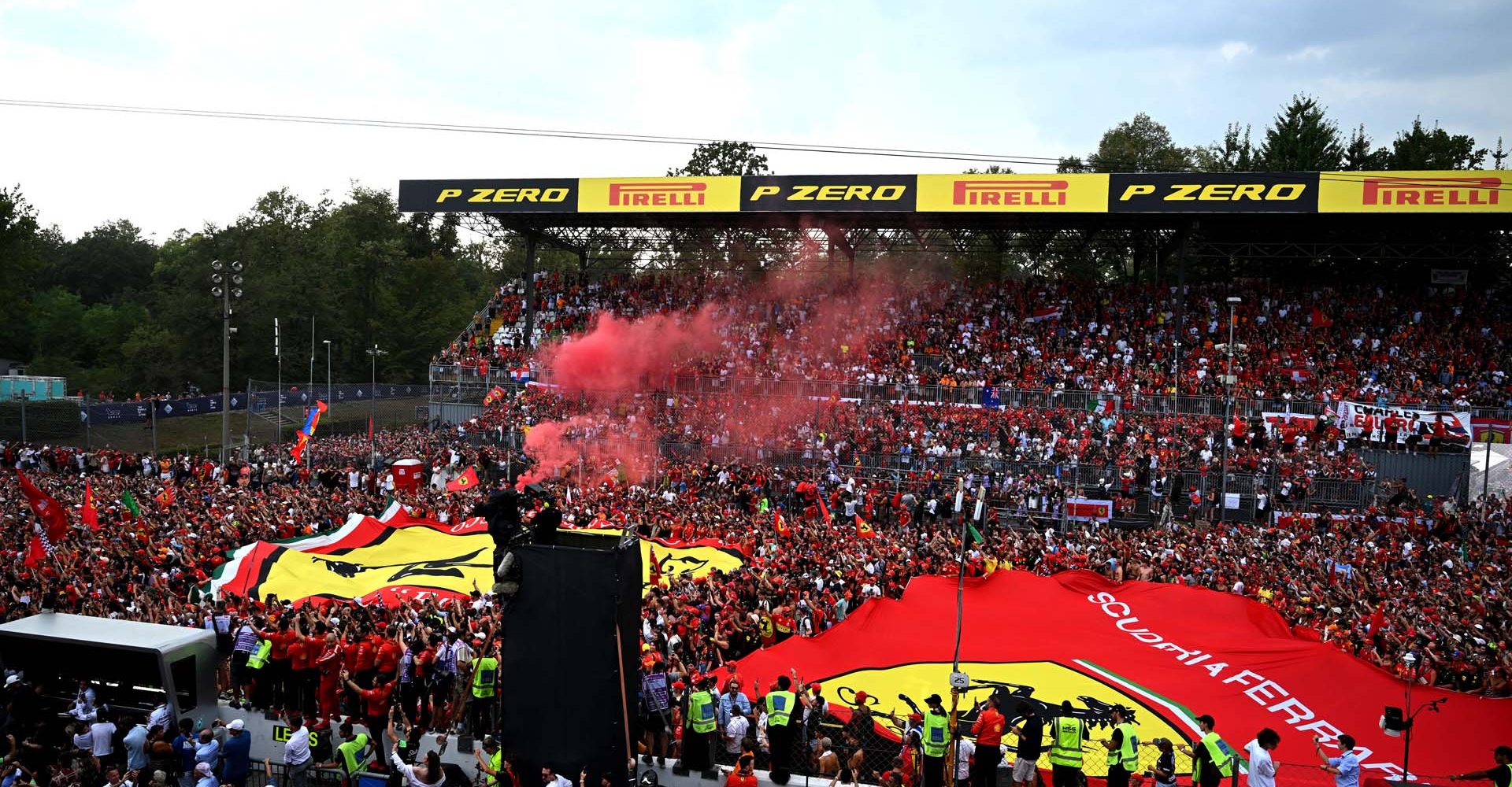 AUTODROMO NAZIONALE MONZA, ITALY - SEPTEMBER 01: The Tifosi show their support during the Podium Ceremony during the Italian GP at Autodromo Nazionale Monza on Sunday September 01, 2024 in Monza, Italy. (Photo by Sam Bagnall / LAT Images)