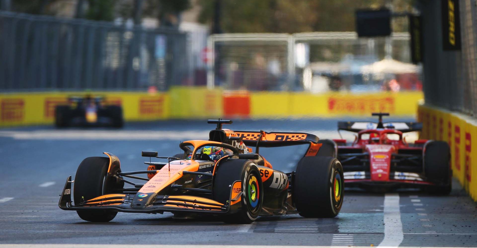 Oscar Piastri, McLaren MCL38, leads Charles Leclerc, Ferrari SF-24 during the Azerbaijan GP at Baku City Circuit