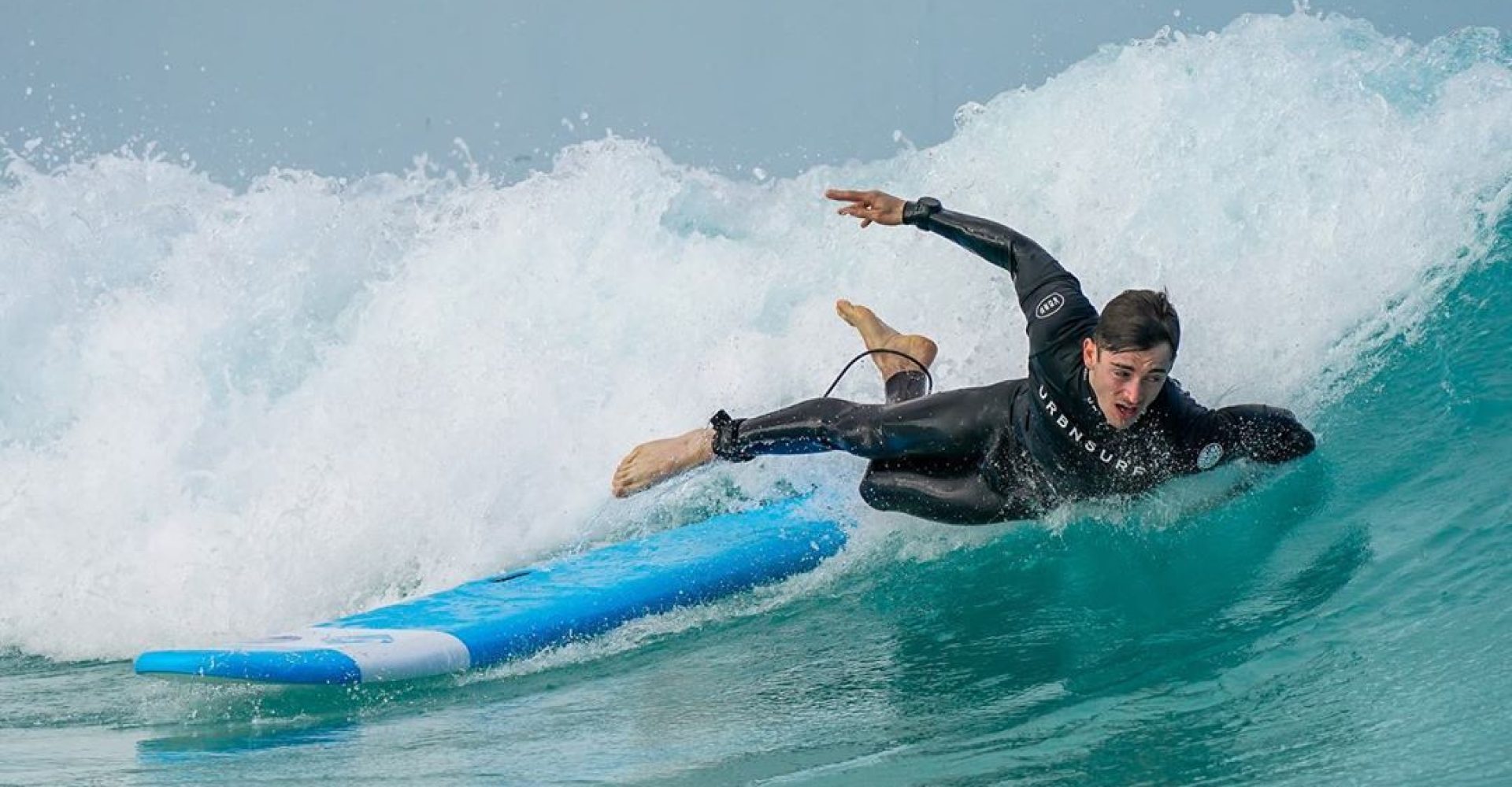 Charles Leclerc surfing