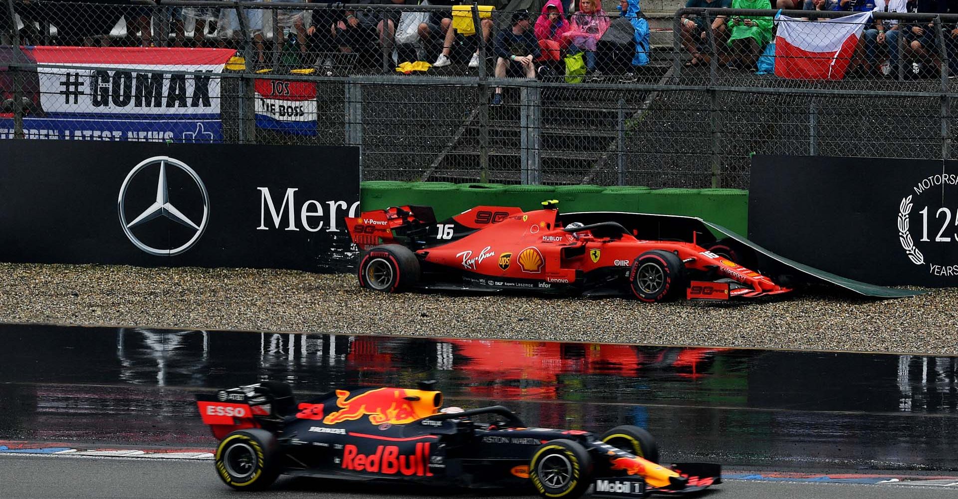 HOCKENHEIM, GERMANY - JULY 28: Max Verstappen of the Netherlands driving the (33) Aston Martin Red Bull Racing RB15 passes as Charles Leclerc of Monaco driving the (16) Scuderia Ferrari SF90 crashes during the F1 Grand Prix of Germany at Hockenheimring on July 28, 2019 in Hockenheim, Germany. (Photo by Dan Mullan/Getty Images) // Getty Images / Red Bull Content Pool  // AP-2139U6N852111 // Usage for editorial use only // Please go to www.redbullcontentpool.com for further information. //