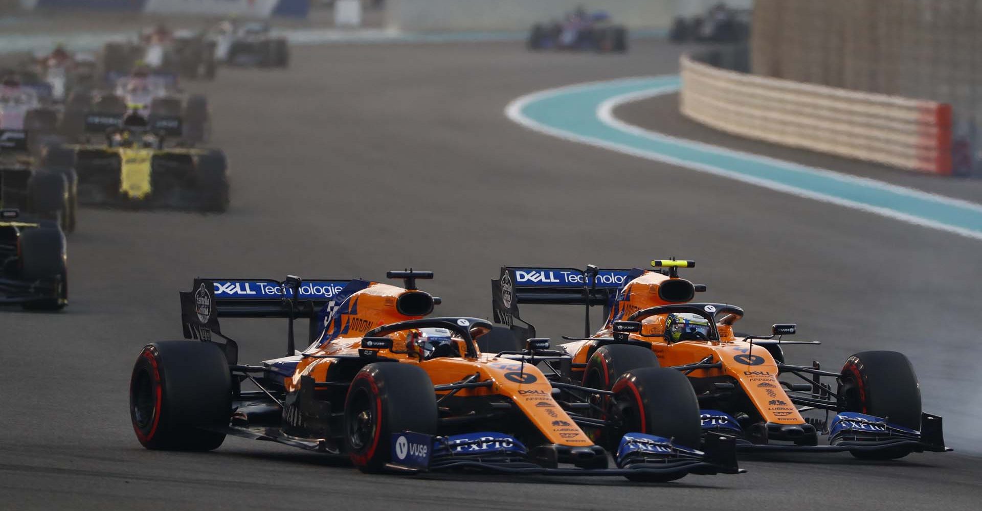 Carlos Sainz, McLaren MCL34 battles with Lando Norris, McLaren MCL34