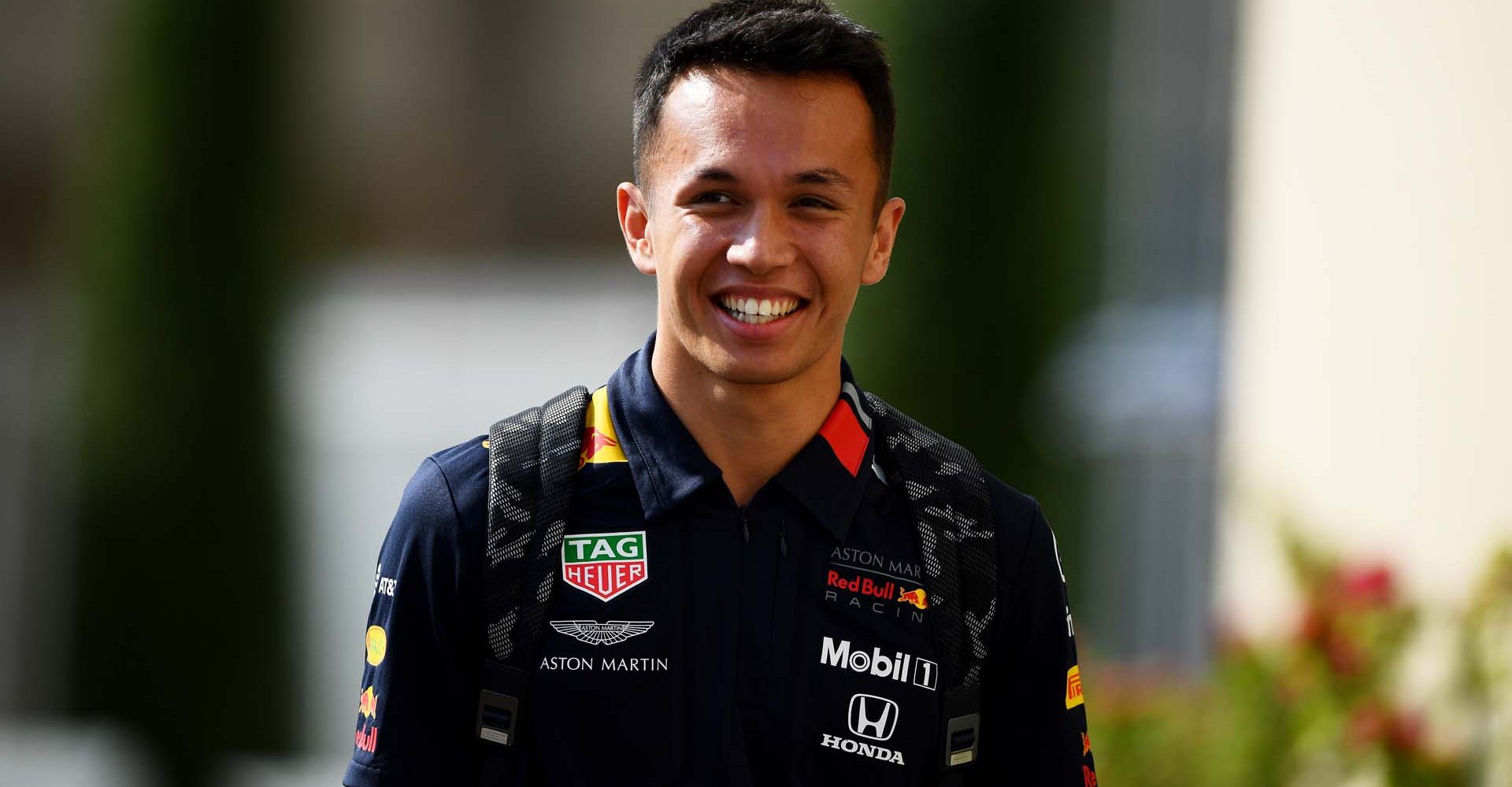 ABU DHABI, UNITED ARAB EMIRATES - NOVEMBER 28: Alexander Albon of Thailand and Red Bull Racing laughs in the Paddock during previews ahead of the F1 Grand Prix of Abu Dhabi at Yas Marina Circuit on November 28, 2019 in Abu Dhabi, United Arab Emirates. (Photo by Clive Mason/Getty Images) // Getty Images / Red Bull Content Pool  // AP-22AUDZMQW1W11 // Usage for editorial use only //