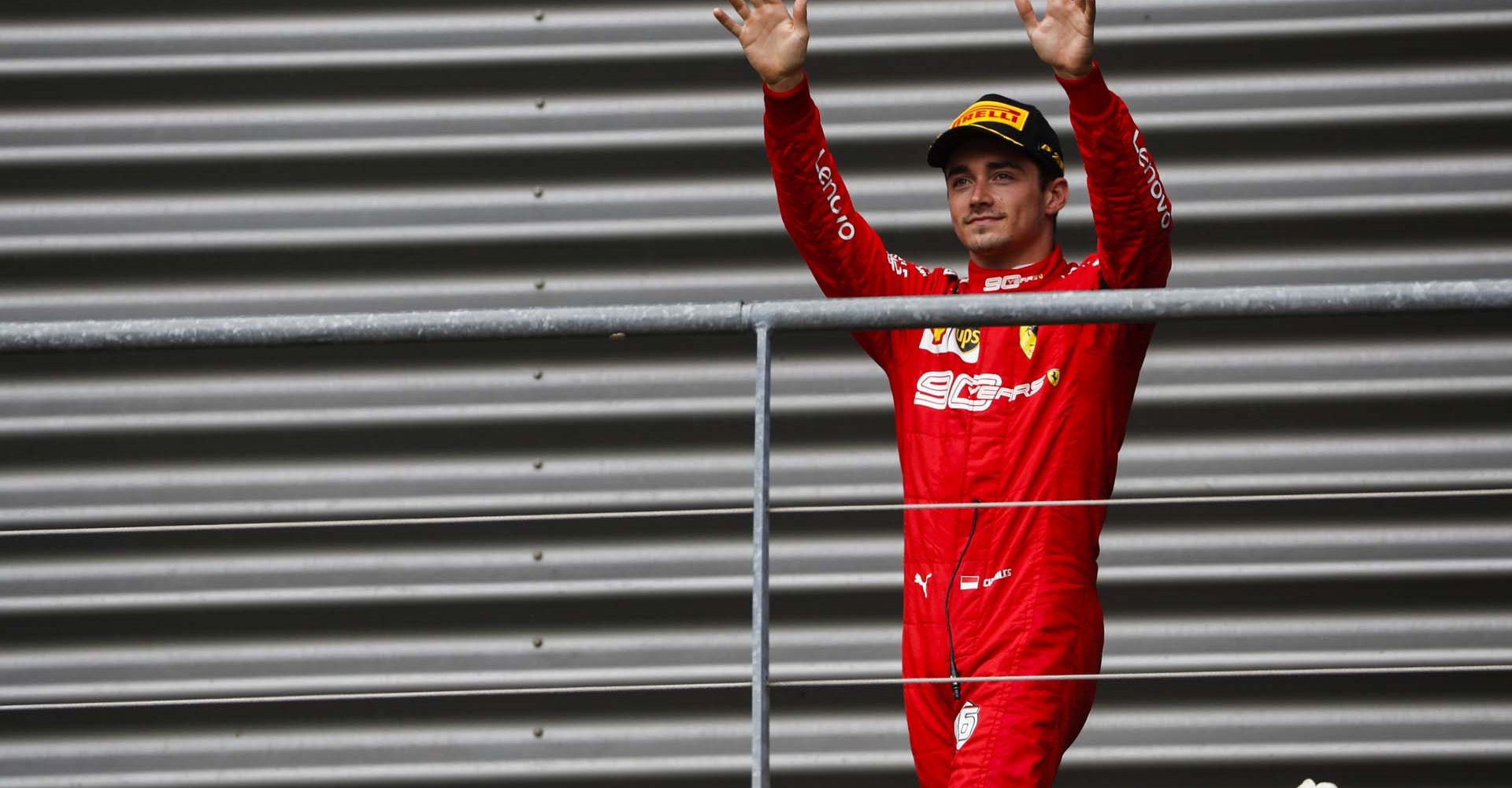 SPA-FRANCORCHAMPS, BELGIUM - SEPTEMBER 01: Charles Leclerc, Ferrari, celebrates victory on the podium during the Belgian GP at Spa-Francorchamps on September 01, 2019 in Spa-Francorchamps, Belgium. (Photo by Sam Bloxham / LAT Images)