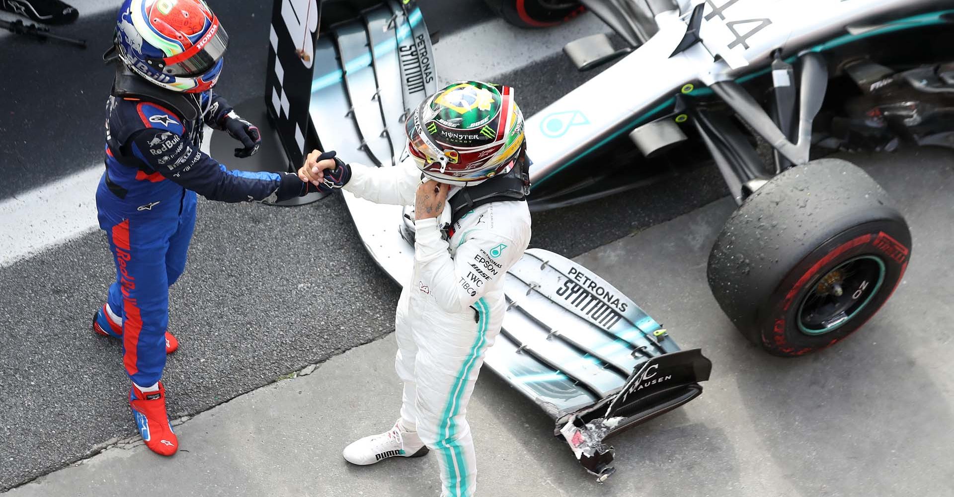 SAO PAULO, BRAZIL - NOVEMBER 17: Second placed Pierre Gasly of France and Scuderia Toro Rosso and third placed Lewis Hamilton of Great Britain and Mercedes GP celebrate in parc ferme during the F1 Grand Prix of Brazil at Autodromo Jose Carlos Pace on November 17, 2019 in Sao Paulo, Brazil. (Photo by Robert Cianflone/Getty Images) // Getty Images / Red Bull Content Pool  // AP-227DRUH212111 // Usage for editorial use only //