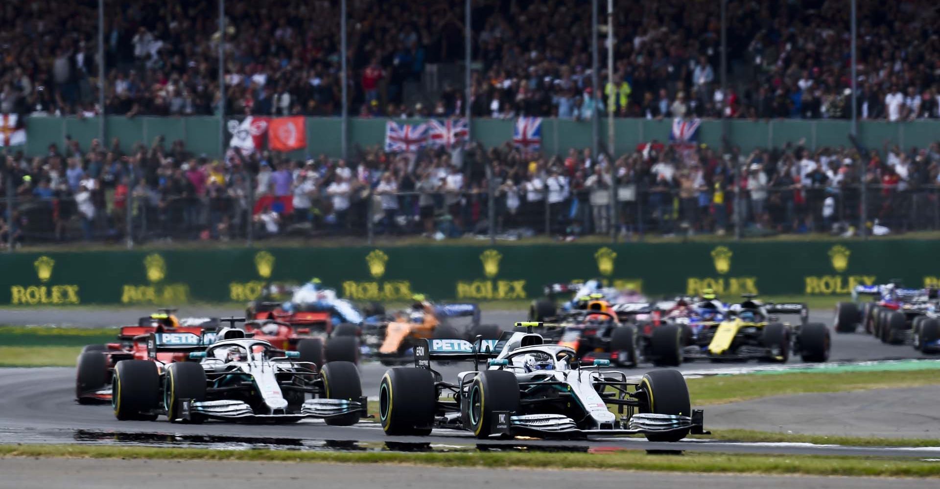 SILVERSTONE, UNITED KINGDOM - JULY 14: Valtteri Bottas, Mercedes AMG W10 leads Valtteri Bottas, Mercedes AMG W10 at the start of the race during the British GP at Silverstone on July 14, 2019 in Silverstone, United Kingdom. (Photo by Gareth Harford / LAT Images)