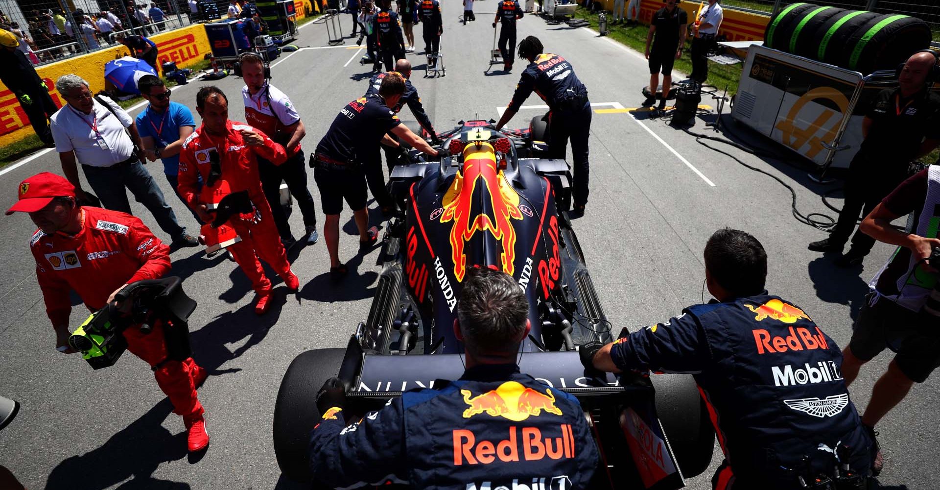 MONTREAL, QC - JUNE 09:  Pierre Gasly of France and Red Bull Racing is pushed to his grid position by members of the team during the F1 Grand Prix of Canada at Circuit Gilles Villeneuve on June 9, 2019 in Montreal, Canada.  (Photo by Dan Istitene/Getty Images) // Getty Images / Red Bull Content Pool  // AP-1ZKN94UF92111 // Usage for editorial use only // Please go to www.redbullcontentpool.com for further information. //