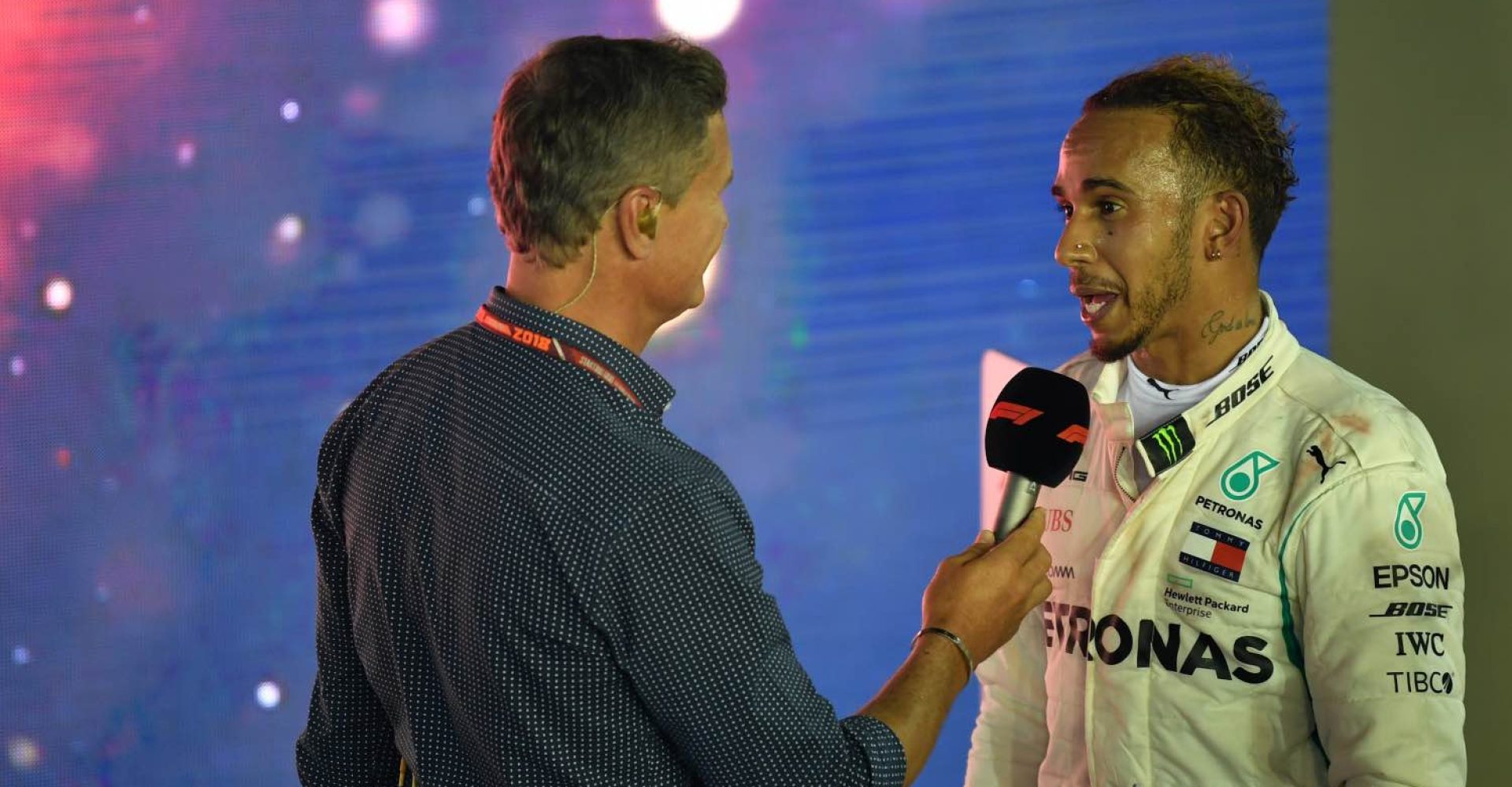 Lewis Hamilton, Mercedes AMG F1 talks with David Coulthard, Channel 4 F1 in parc ferme at Formula One World Championship, Rd15, Singapore Grand Prix, Race, Marina Bay Circuit, Singapore, Sunday 16 September 2018.