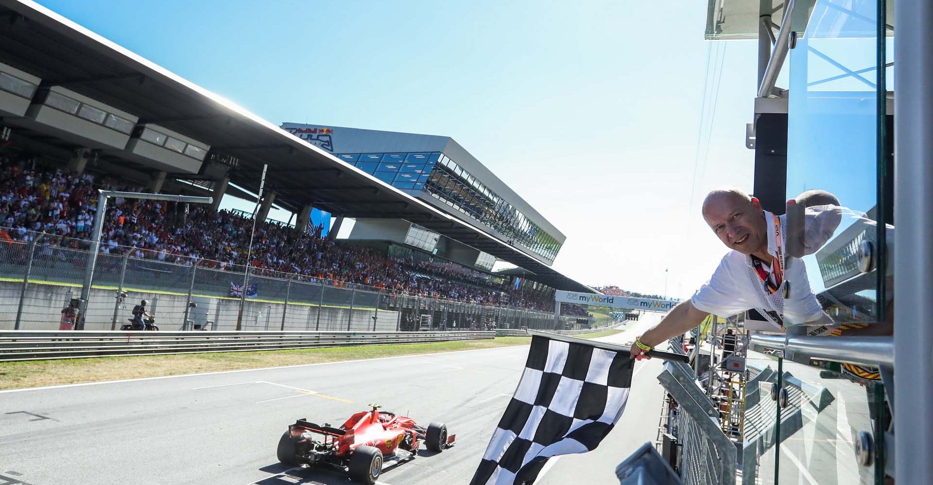 SPIELBERG,AUSTRIA,30.JUN.19 - MOTORSPORTS, FORMULA 1 - Grand Prix of Austria, Red Bull Ring. Image shows Charles Leclerc (MON/ Ferrari) and the superfan. Photo: GEPA pictures/ Daniel Goetzhaber - For editorial use only. Image is free of charge.