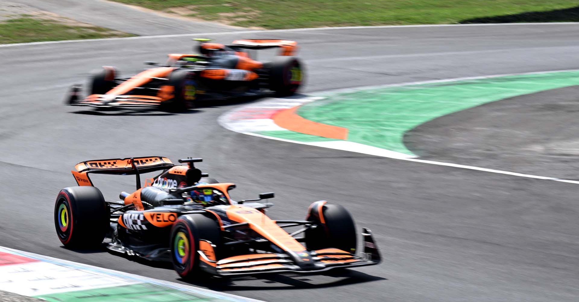 Oscar Piastri, McLaren MCL38, leads Lando Norris, McLaren MCL38