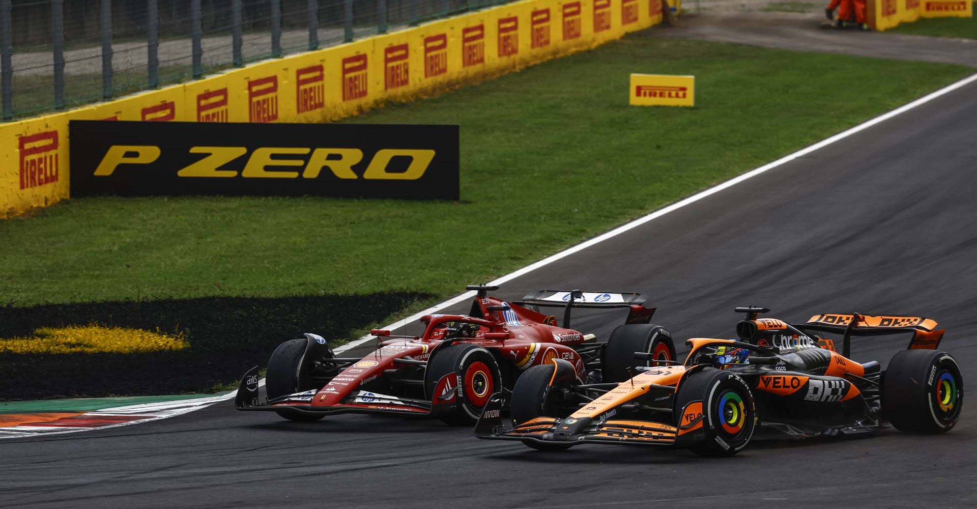 Charles Leclerc, Ferrari SF-24, battles with Oscar Piastri, McLaren MCL38