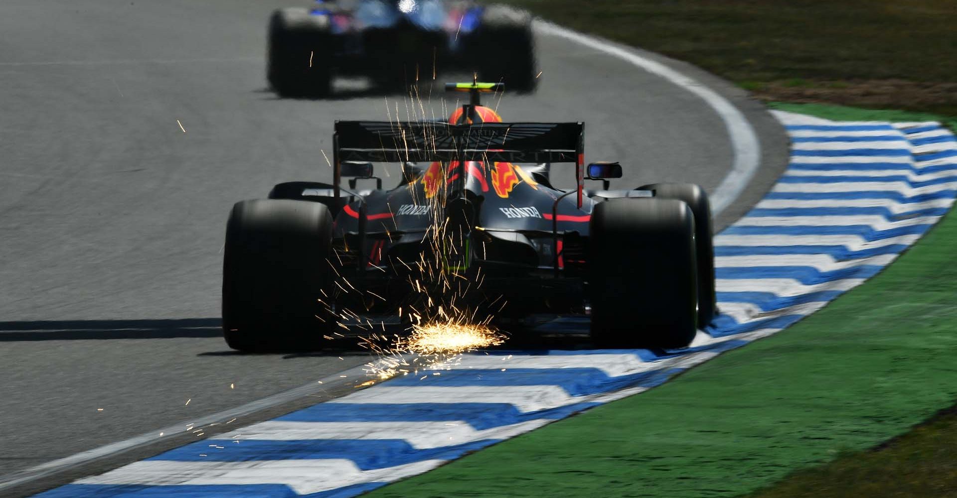 HOCKENHEIM, GERMANY - JULY 26: Sparks fly behind Pierre Gasly of France driving the (10) Aston Martin Red Bull Racing RB15 on track during practice for the F1 Grand Prix of Germany at Hockenheimring on July 26, 2019 in Hockenheim, Germany. (Photo by Dan Mullan/Getty Images) // Getty Images / Red Bull Content Pool  // AP-212KG5VJD2511 // Usage for editorial use only // Please go to www.redbullcontentpool.com for further information. //