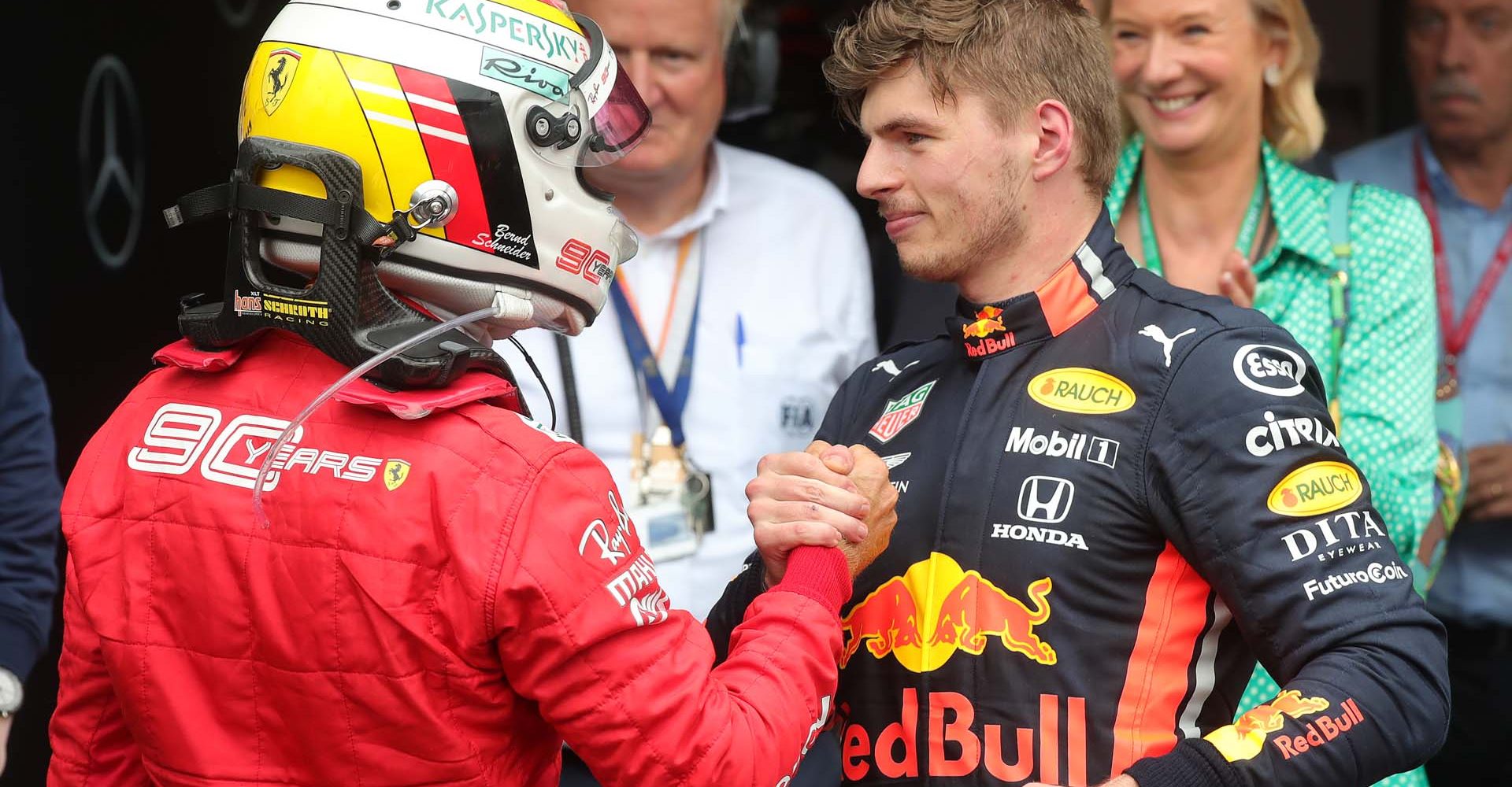 HOCKENHEIM, GERMANY - JULY 28: Race winner Max Verstappen of Netherlands and Red Bull Racing and second placed Sebastian Vettel of Germany and Ferrari celebrate in parc ferme during the F1 Grand Prix of Germany at Hockenheimring on July 28, 2019 in Hockenheim, Germany. (Photo by Alexander Hassenstein/Getty Images) // Getty Images / Red Bull Content Pool  // AP-213AK55FD2111 // Usage for editorial use only // Please go to www.redbullcontentpool.com for further information. //