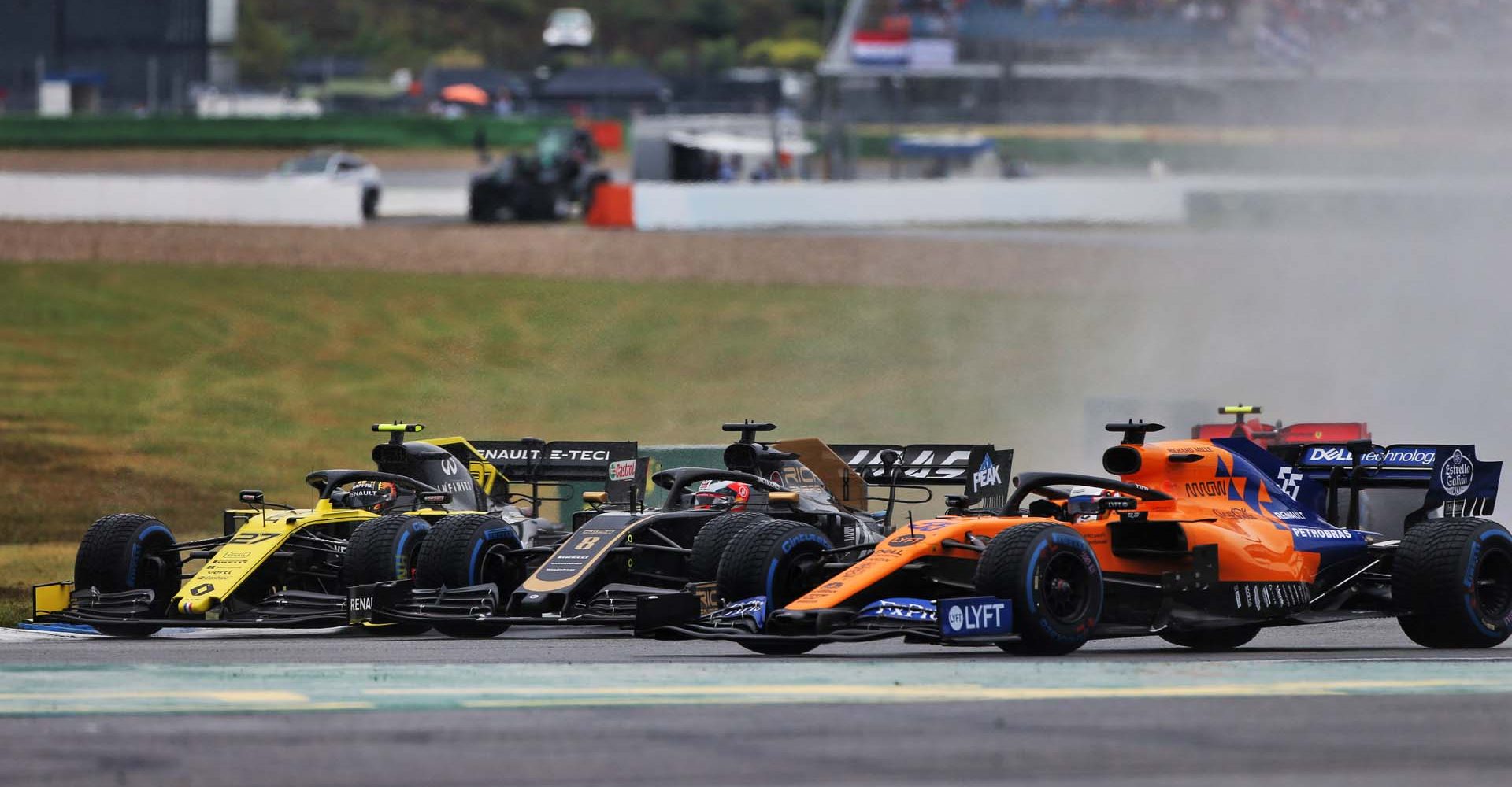 (L to R): Nico Hulkenberg (GER) Renault F1 Team RS19, Romain Grosjean (FRA) Haas F1 Team VF-19, and Carlos Sainz Jr (ESP) McLaren MCL34.
German Grand Prix, Sunday 28th July 2019. Hockenheim, Germany.