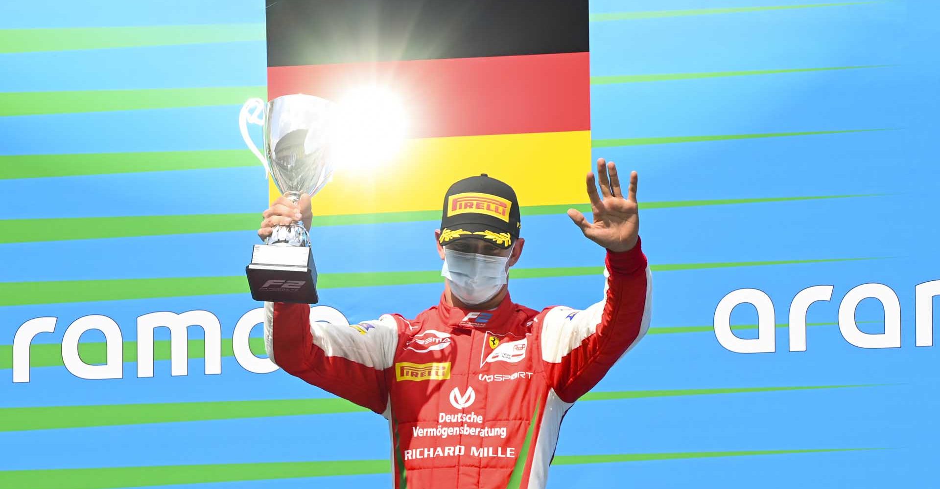 CIRCUIT DE BARCELONA-CATALUNYA, SPAIN - AUGUST 16: Mick Schumacher (DEU, PREMA RACING) celebrates on the podium with the trophy at Circuit de Barcelona-Catalunya on Sunday August 16, 2020 in Barcelona, Spain. (Photo by Mark Sutton / Sutton Images)