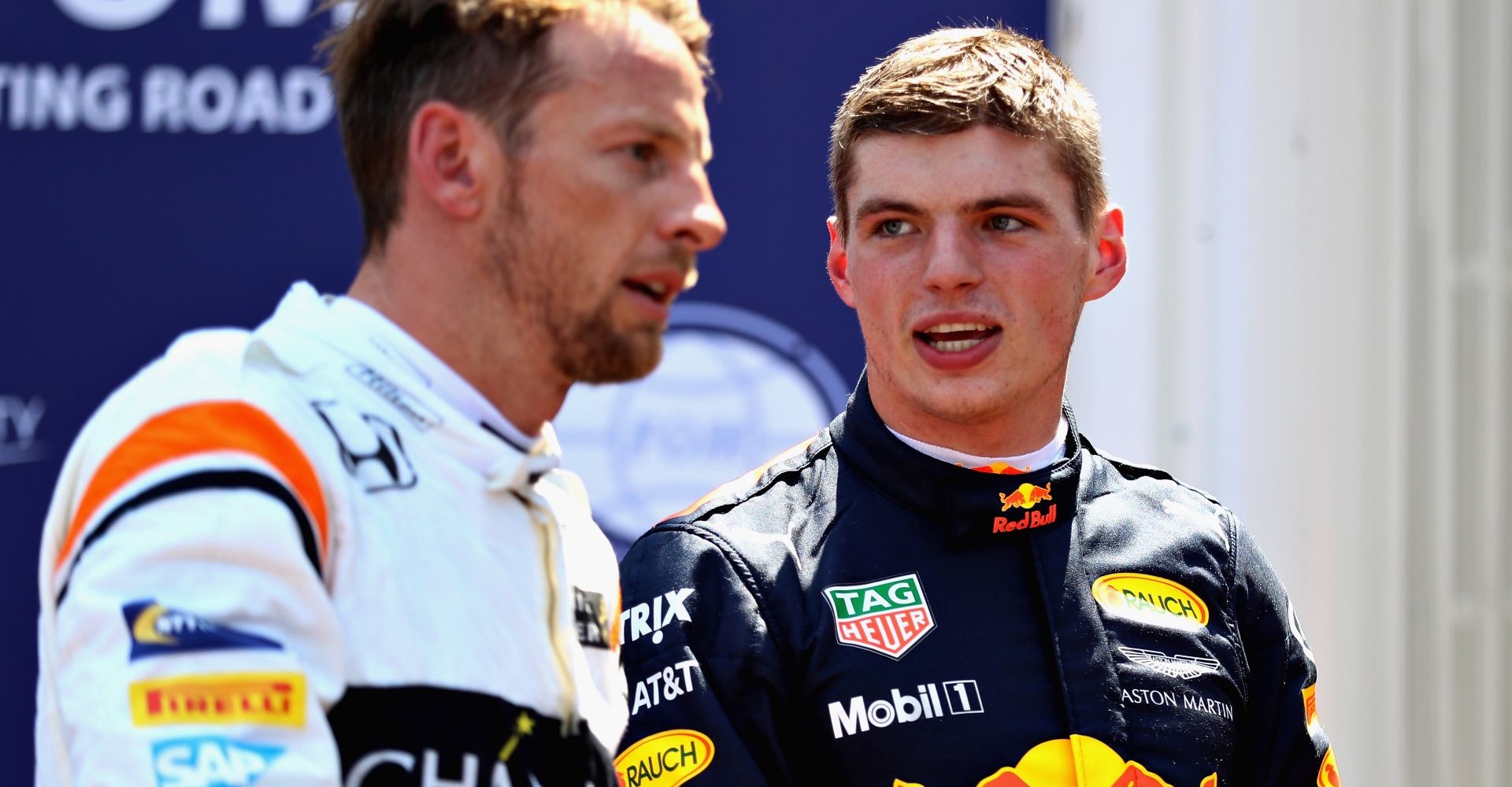 MONTE-CARLO, MONACO - MAY 27: Max Verstappen of Netherlands and Red Bull Racing talks with Jenson Button of Great Britain and McLaren Honda in parc ferme during qualifying for the Monaco Formula One Grand Prix at Circuit de Monaco on May 27, 2017 in Monte-Carlo, Monaco.  (Photo by Will Taylor-Medhurst/Getty Images)