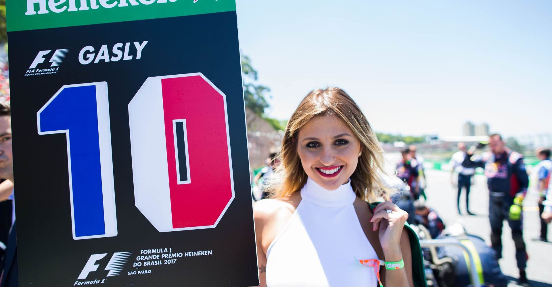 SAO PAULO, BRAZIL - NOVEMBER 12:  Pierre Gasly of Scuderia Toro Rosso and France grid girl during the Formula One Grand Prix of Brazil at Autodromo Jose Carlos Pace on November 12, 2017 in Sao Paulo, Brazil.  (Photo by Peter Fox/Getty Images)