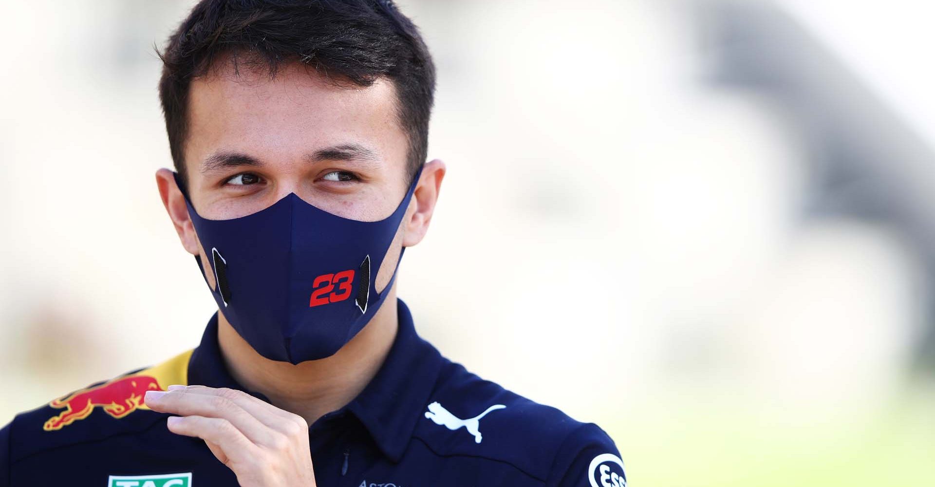 BAHRAIN, BAHRAIN - NOVEMBER 26: Alexander Albon of Thailand and Red Bull Racing looks on in the Paddock during previews ahead of the F1 Grand Prix of Bahrain at Bahrain International Circuit on November 26, 2020 in Bahrain, Bahrain. (Photo by Mark Thompson/Getty Images)