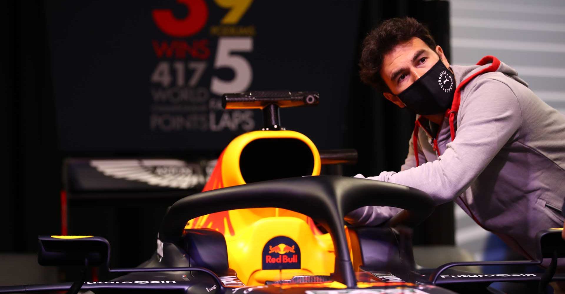 MILTON KEYNES, ENGLAND - JANUARY 11: Sergio Perez of Mexico and Red Bull Racing looks at the history of the team at MK-7 at Red Bull Racing Factory on January 11, 2021 in Milton Keynes, England. (Photo by Mark Thompson/Getty Images)