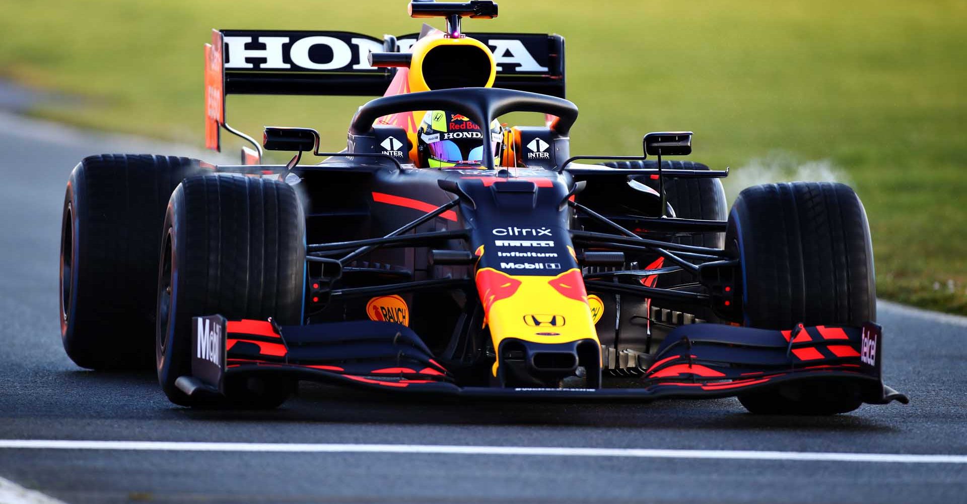 NORTHAMPTON, ENGLAND - FEBRUARY 22: Sergio Perez of Mexico driving the (11) Red Bull Racing RB15 Honda at Silverstone on February 22, 2021 in Northampton, England. (Photo by Bryn Lennon/Getty Images for Red Bull Racing)